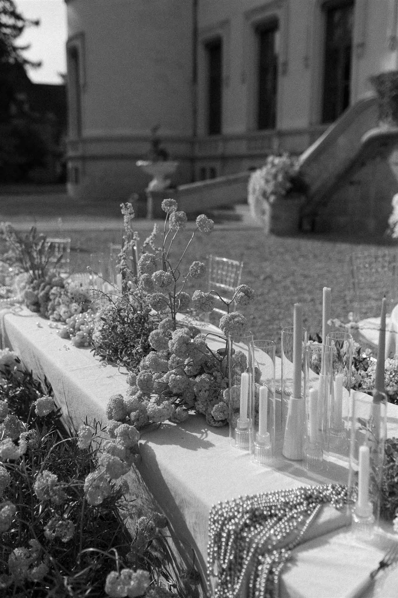 Black and white photo of wedding reception table setting