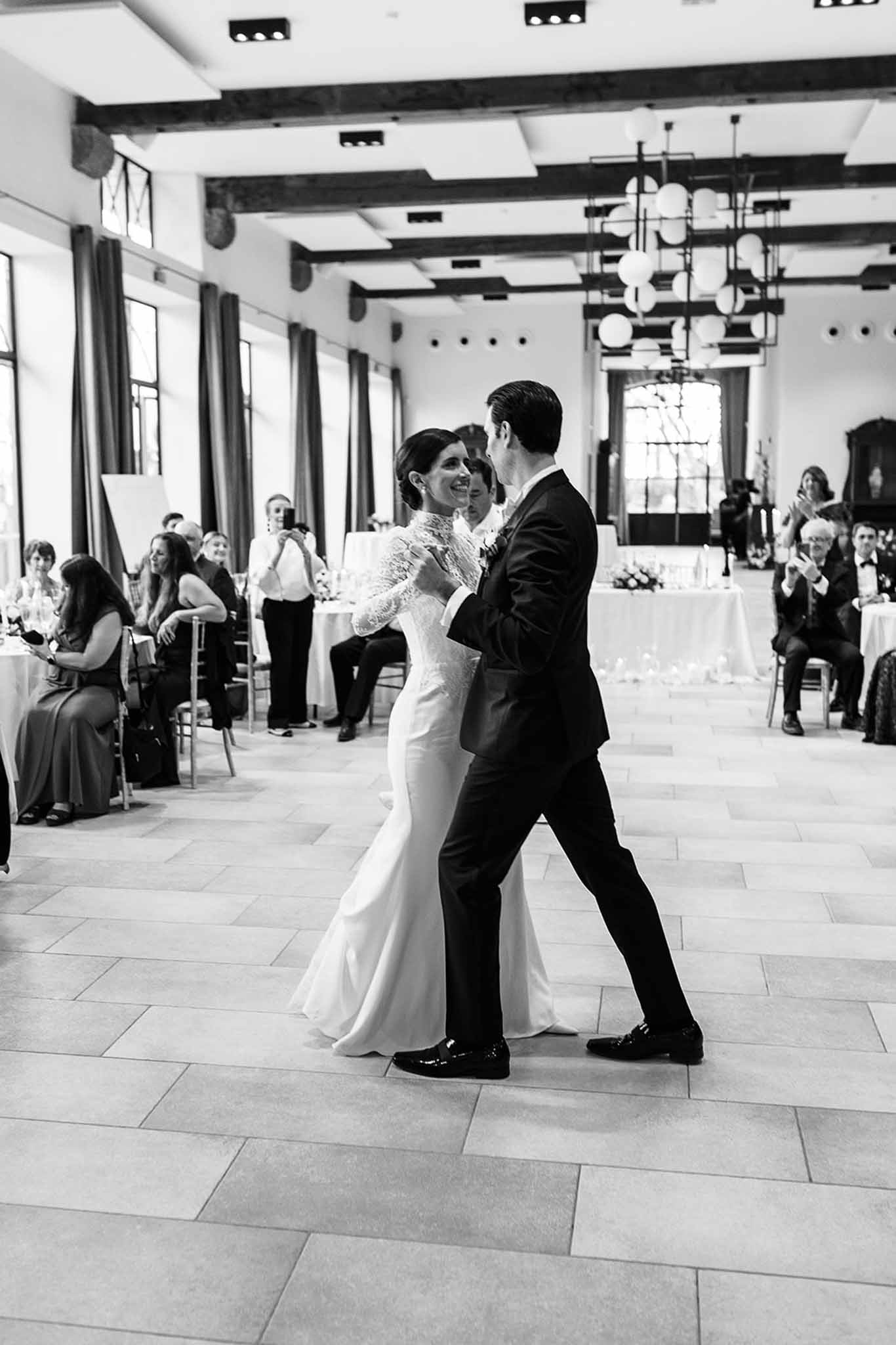 Black and white photo of wedding reception table setting