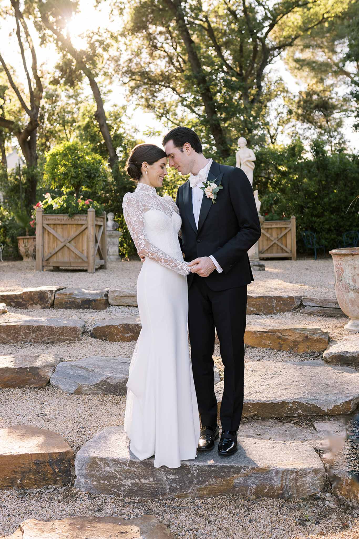 Bride and groom portrait in a garden
