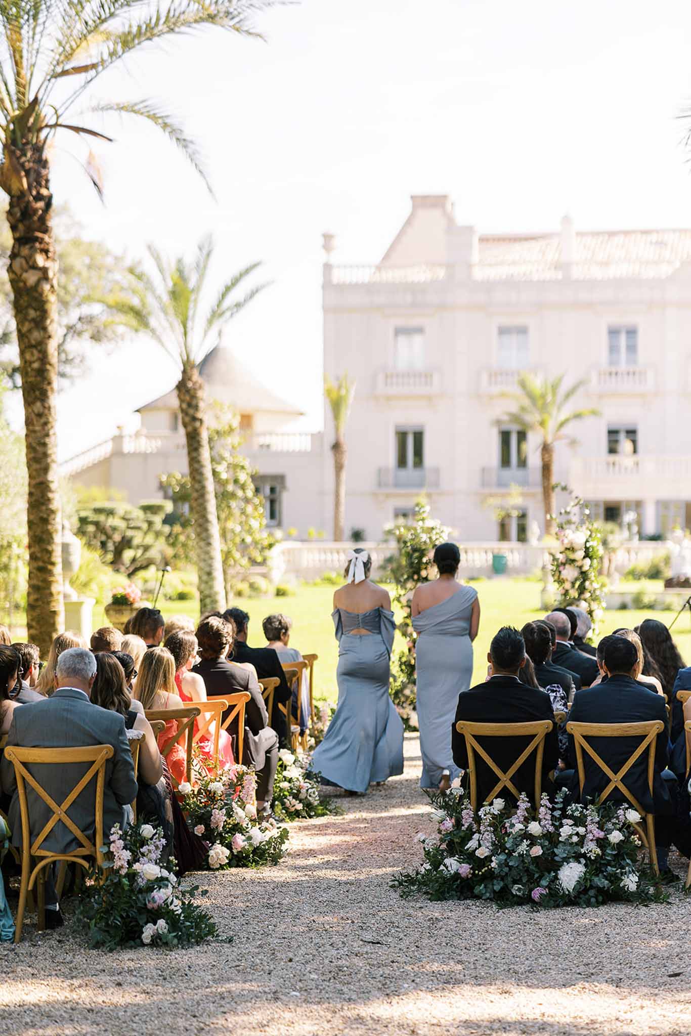 Wedding ceremony in a garden with white roses