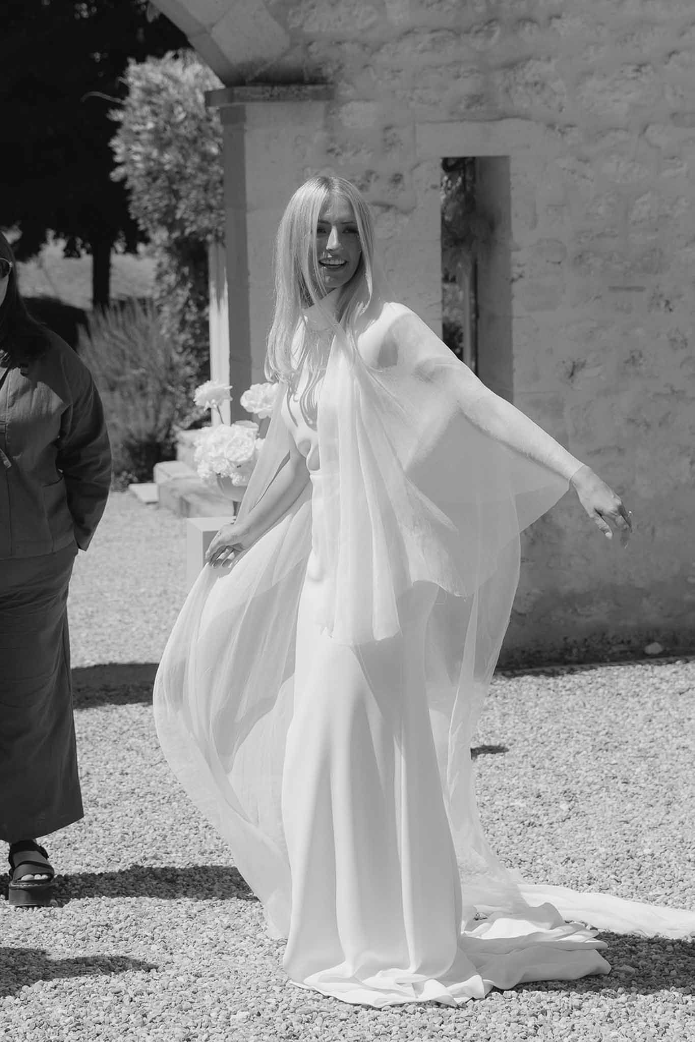 Black and white photo of wedding ceremony setup with hydrangeas