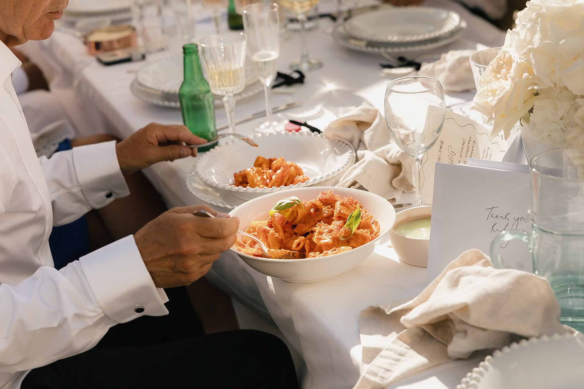 Wedding reception table setting with hydrangeas