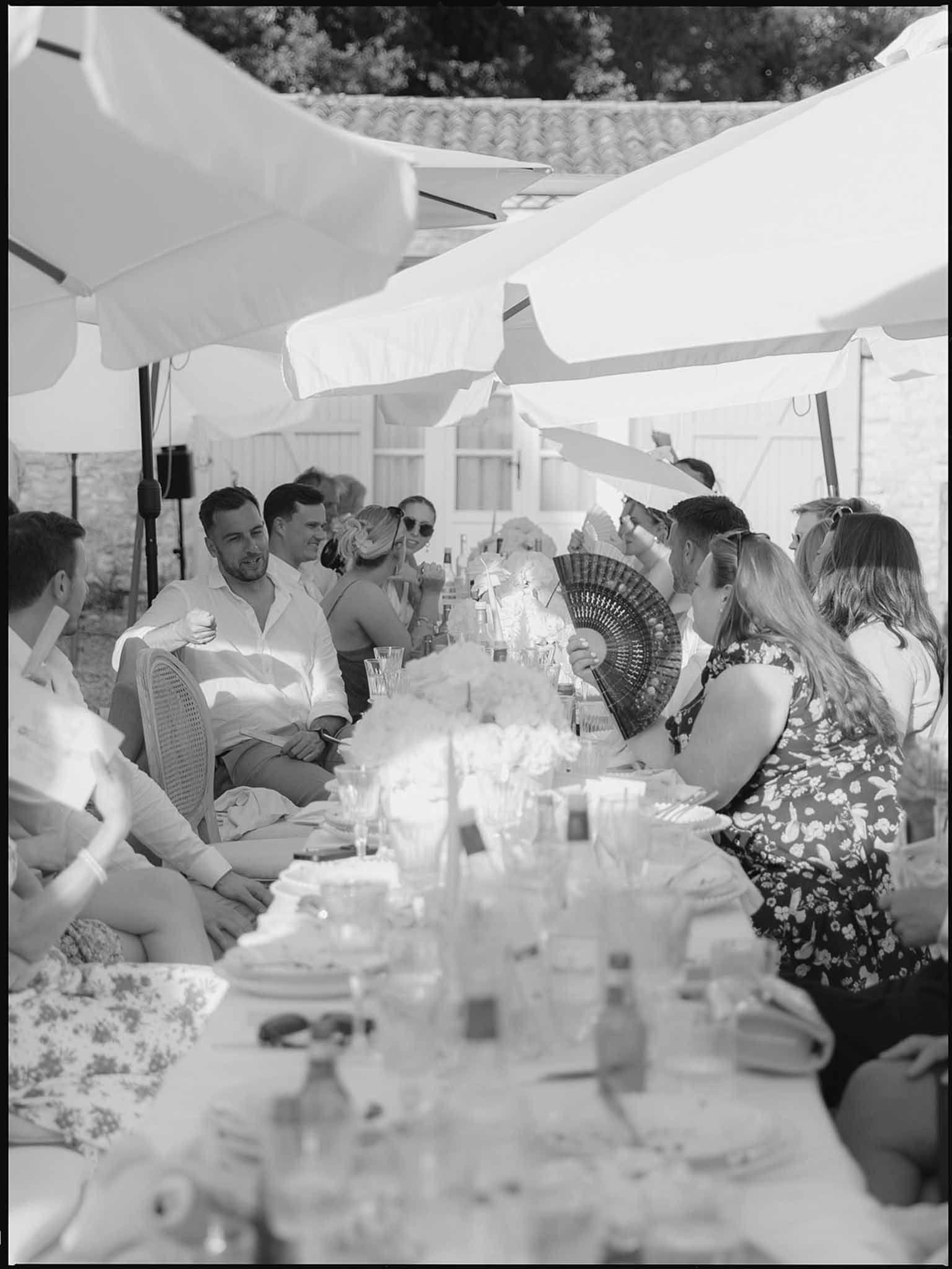 Black and white photo of wedding reception table setting
