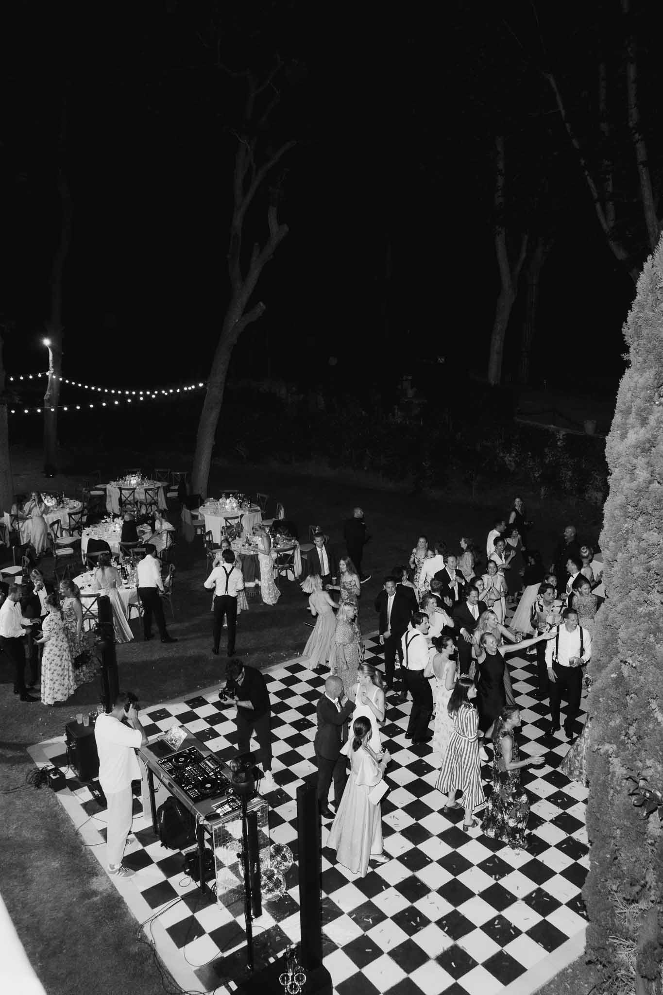 Black and white photo of wedding reception table setting