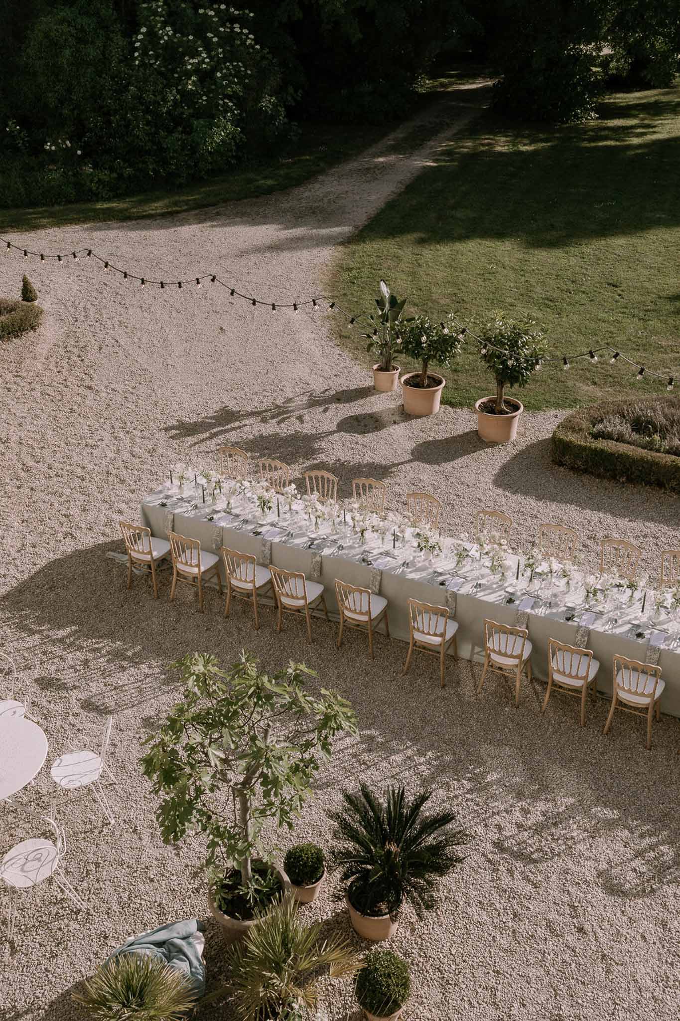 Wedding reception table setting in a garden