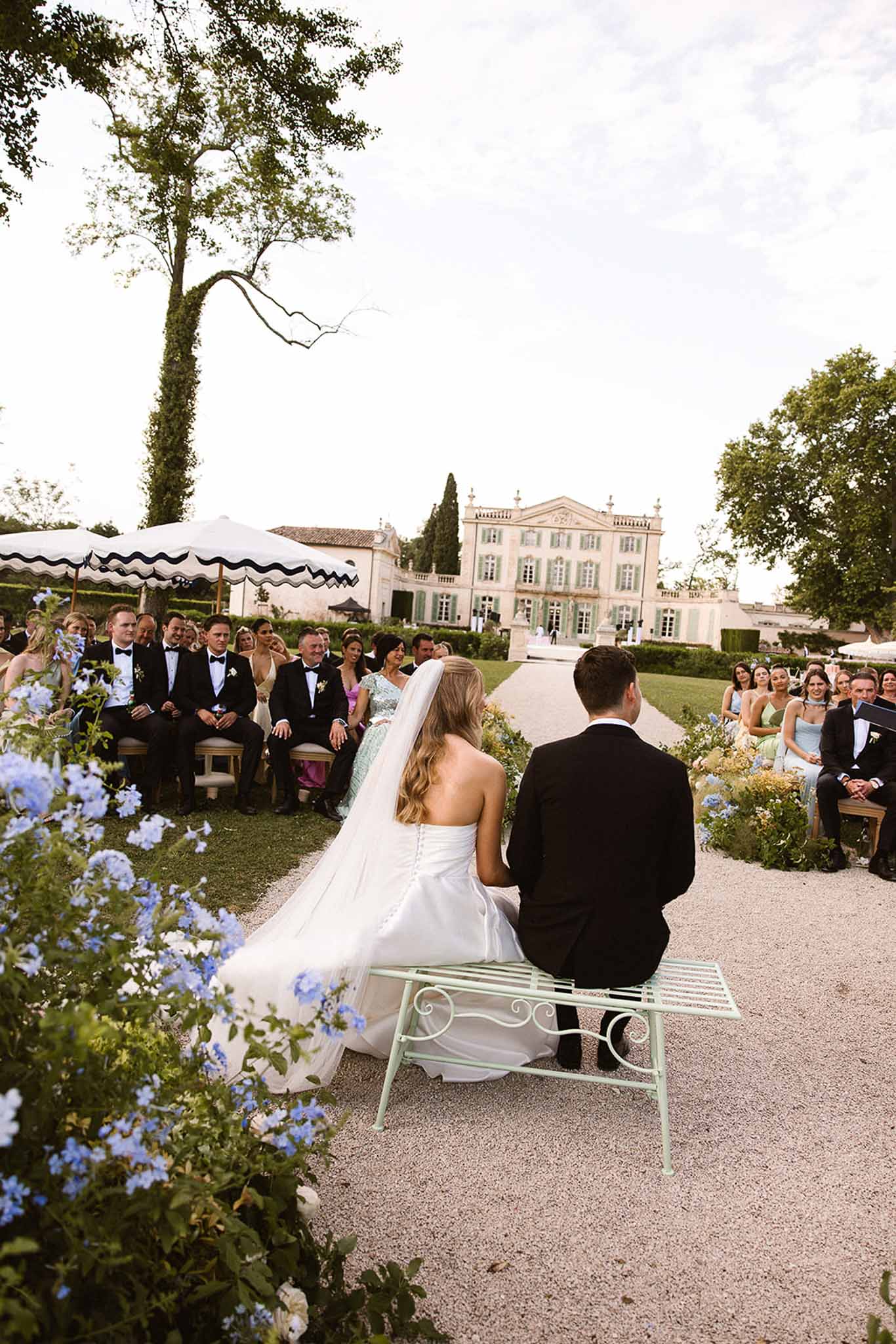 Wedding ceremony in a garden with white roses