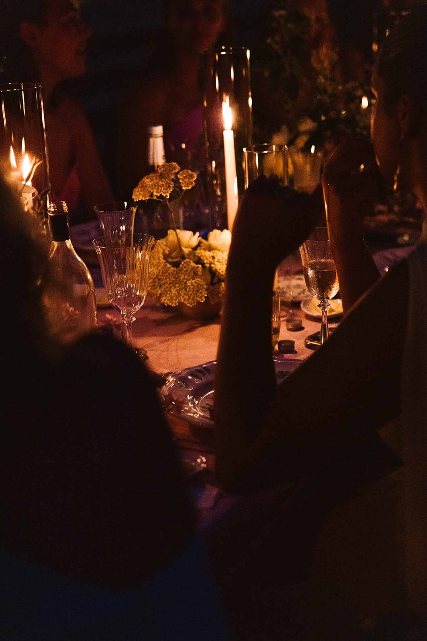 Wedding reception speech in a garden with white roses