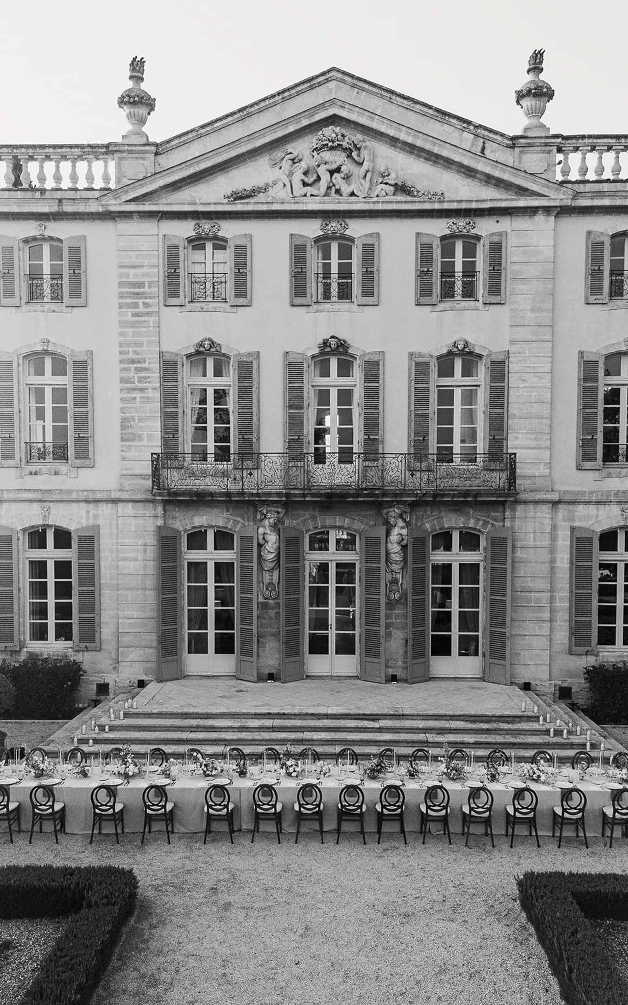 Black and white photo of wedding reception table setting