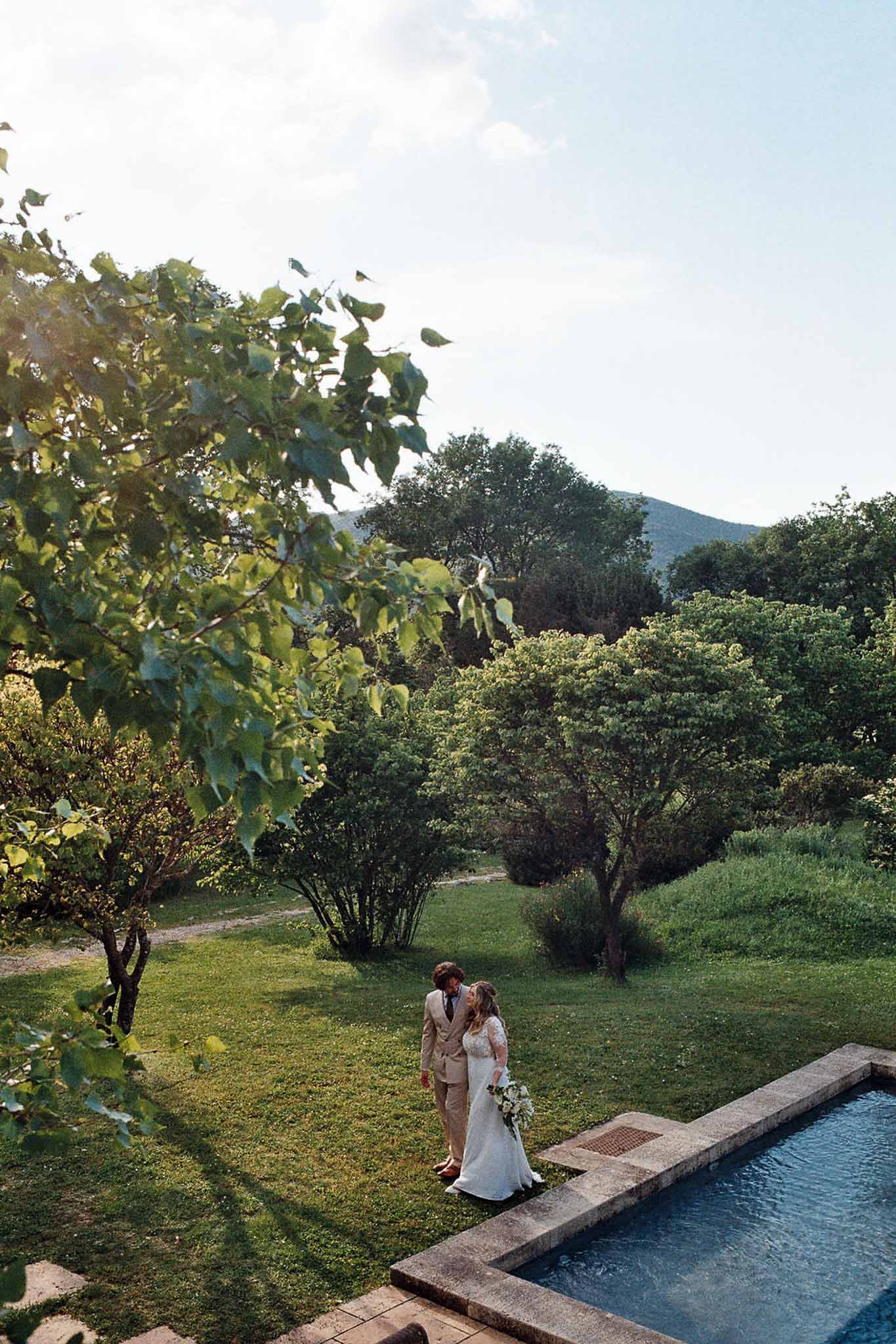 Bride and groom portrait in a garden