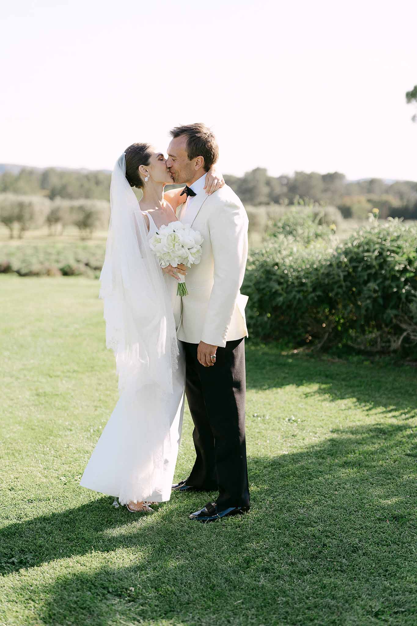 Bride and groom kissing
