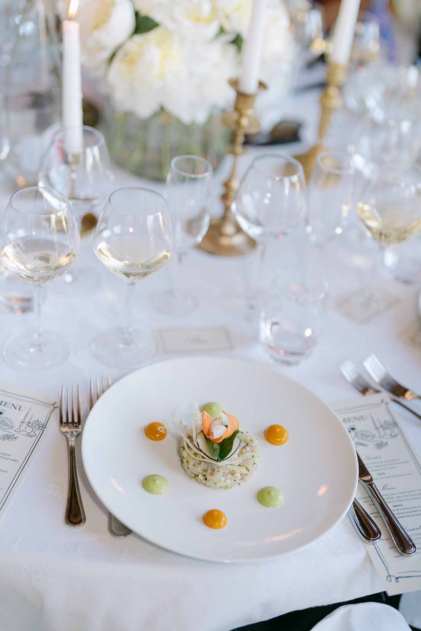 Wedding reception table setting with peonies
