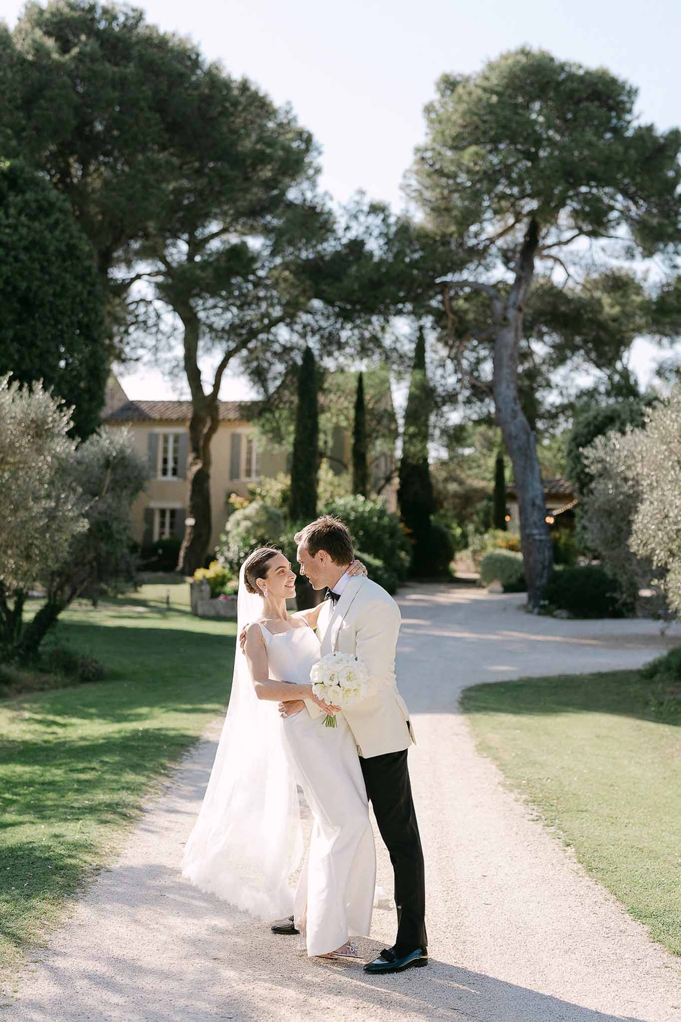 Bride and groom portrait in a garden