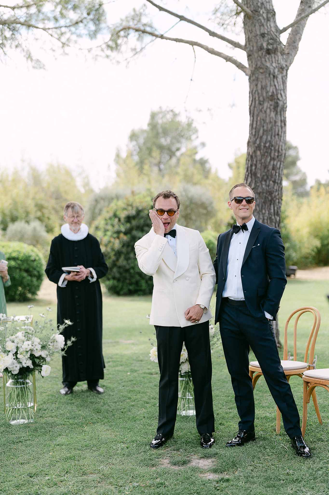 Wedding ceremony in a garden with white roses
