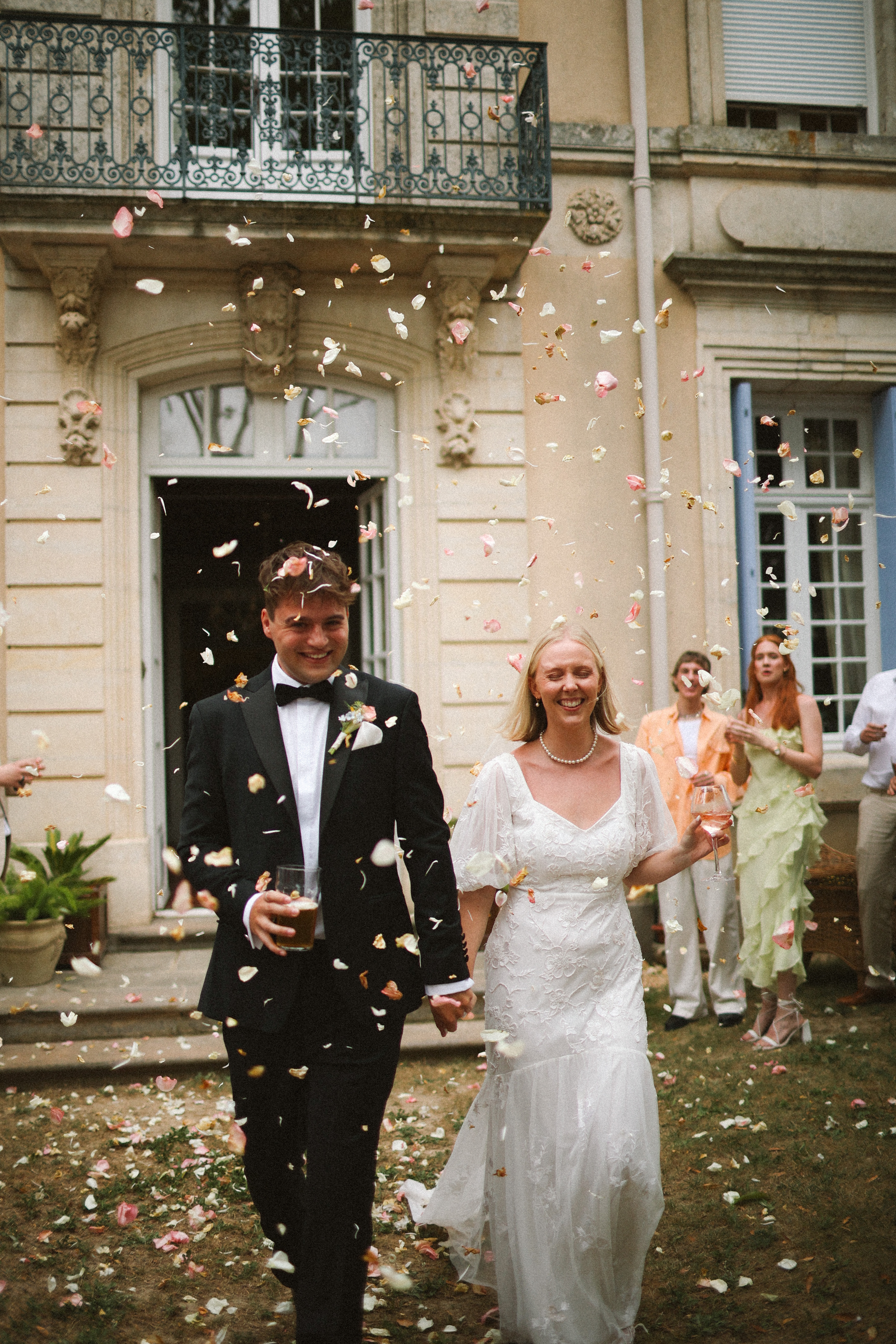 Petal toss exit from chateau doorway at Chateau du Puits es Pratx, Ginestas