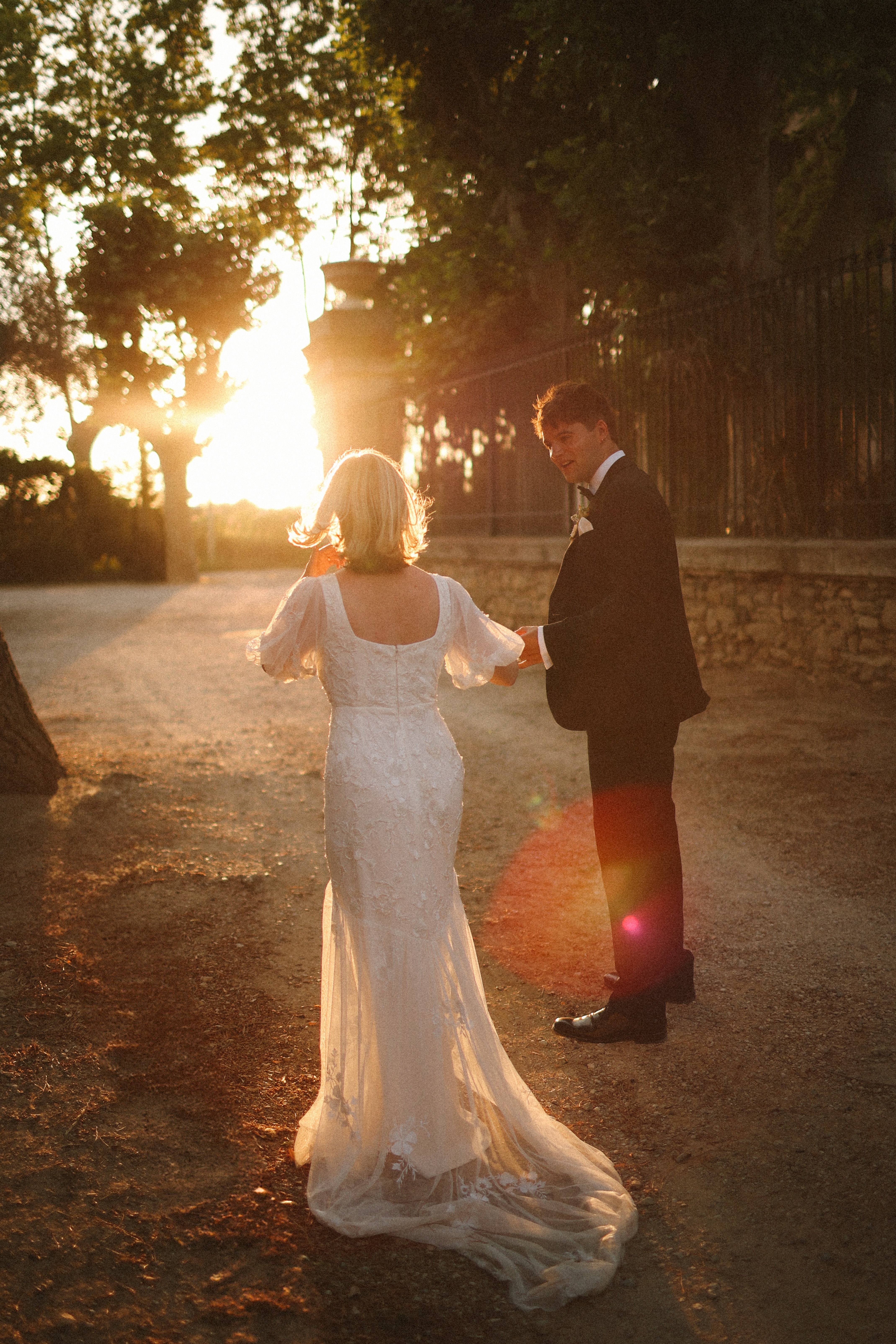 Couple in silhouette at golden hour at Chateau du Puits es Pratx, Ginestas