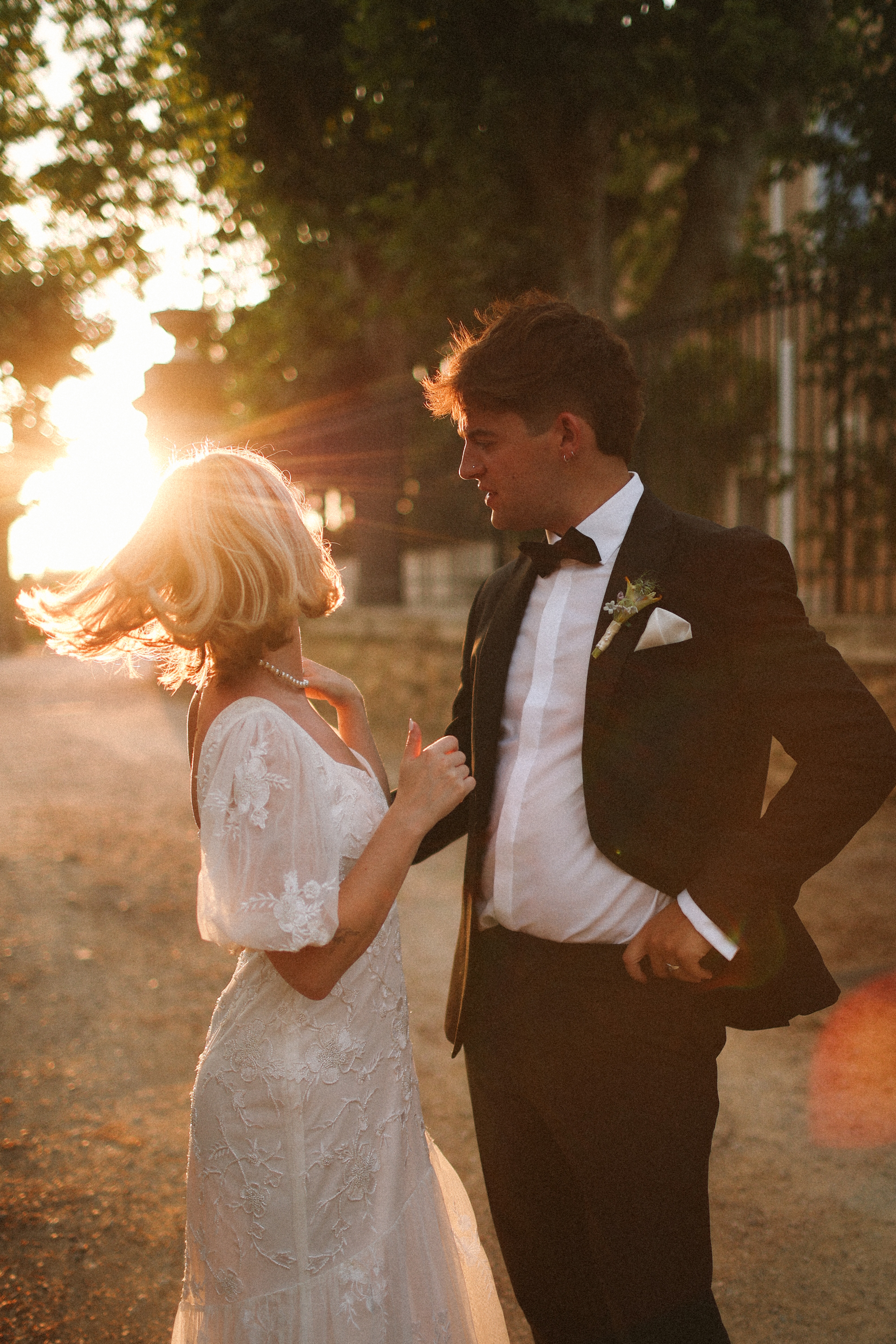 Couple close up with golden hour flare at Chateau du Puits es Pratx, Ginestas