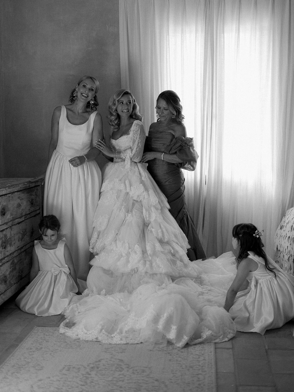 bride with family before the ceremony, black and white at La Bastide de Laurence, Provence