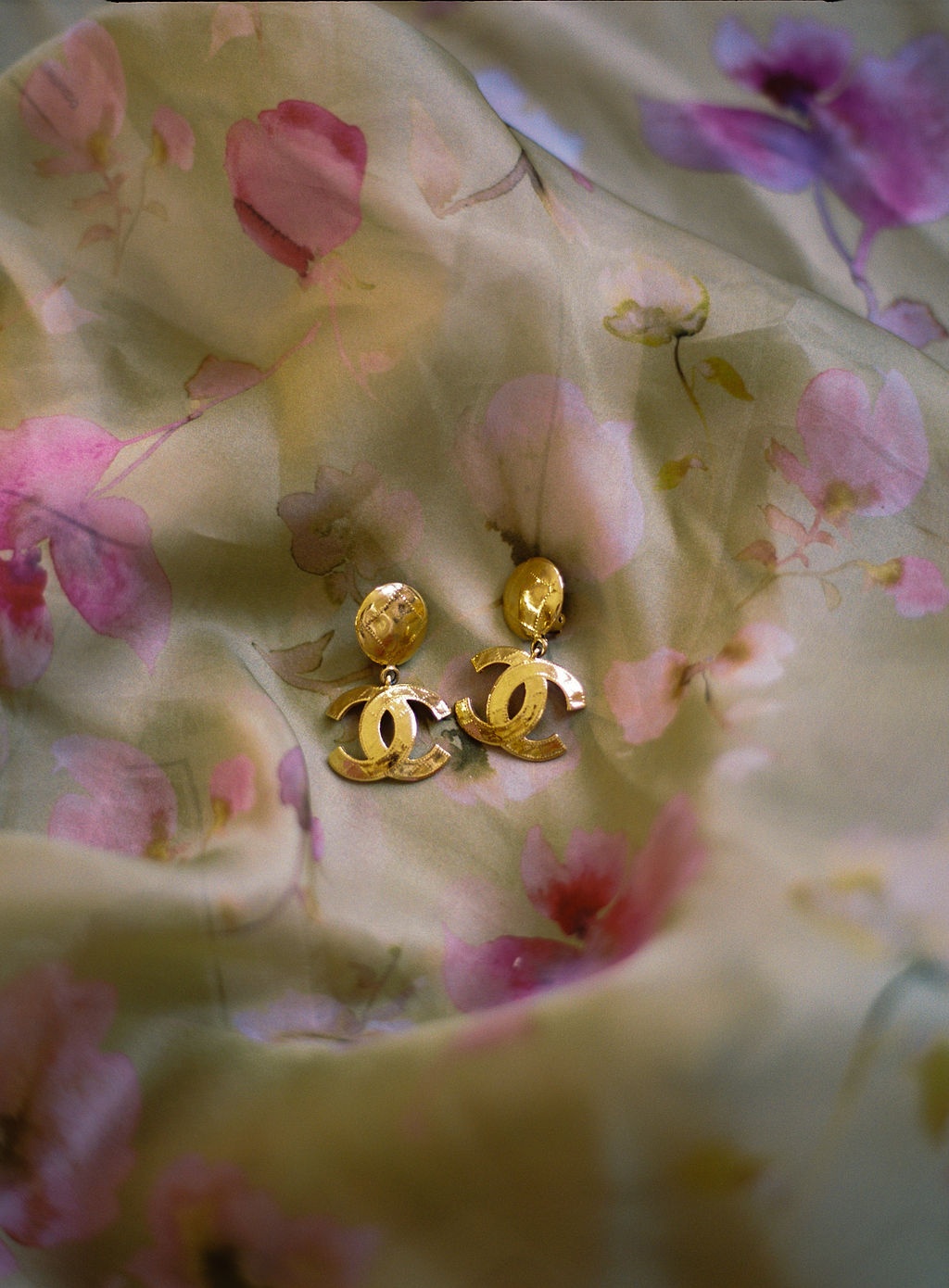 Chanel earrings on watercolour silk at La Bastide de Laurence, Provence