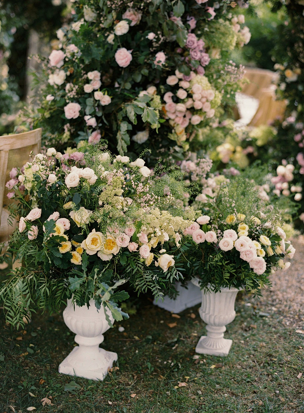 ceremony urns of pink roses and cosmos at La Bastide de Laurence, Provence