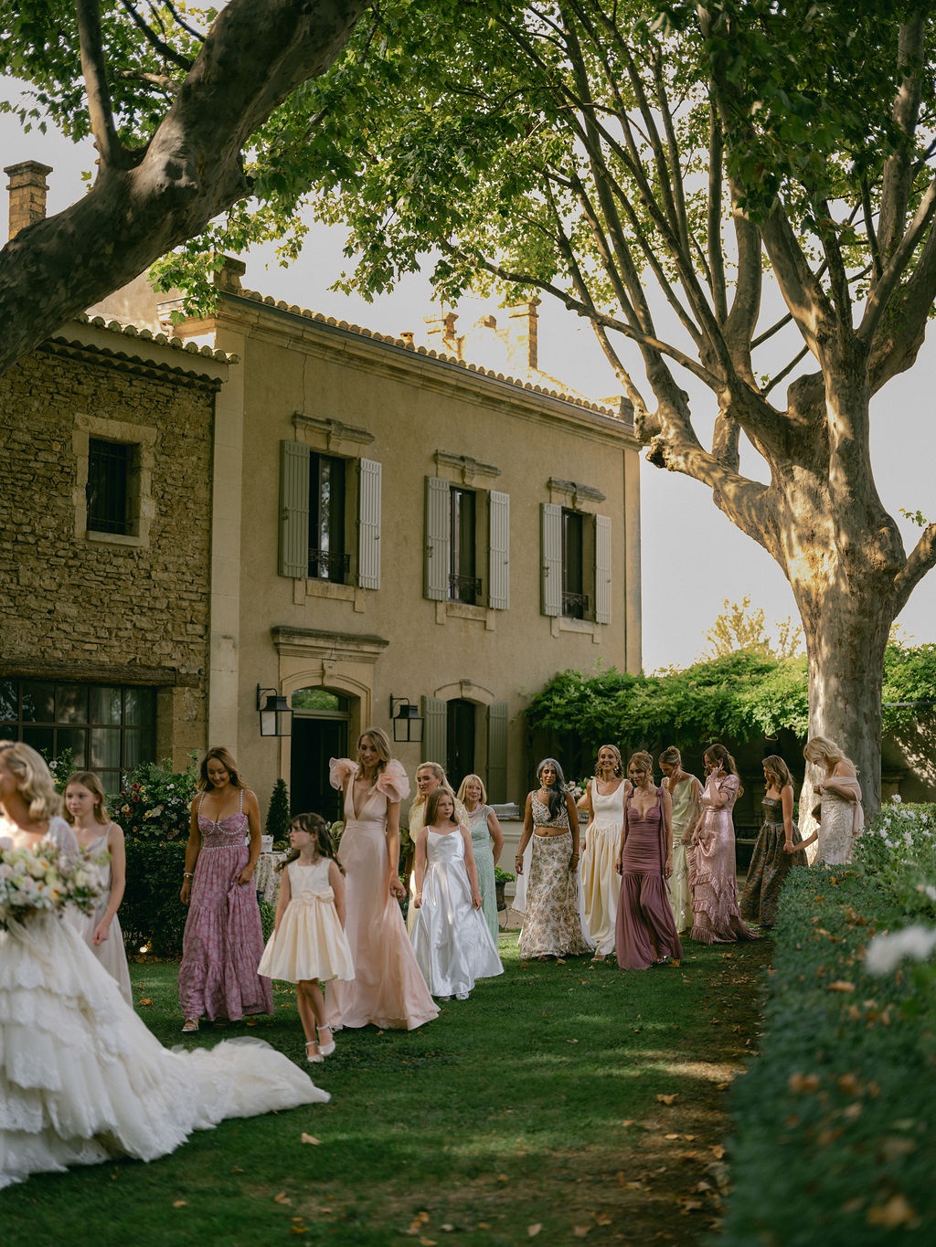 bridesmaids with cafe-au-lait rose bouquets at La Bastide de Laurence, Provence