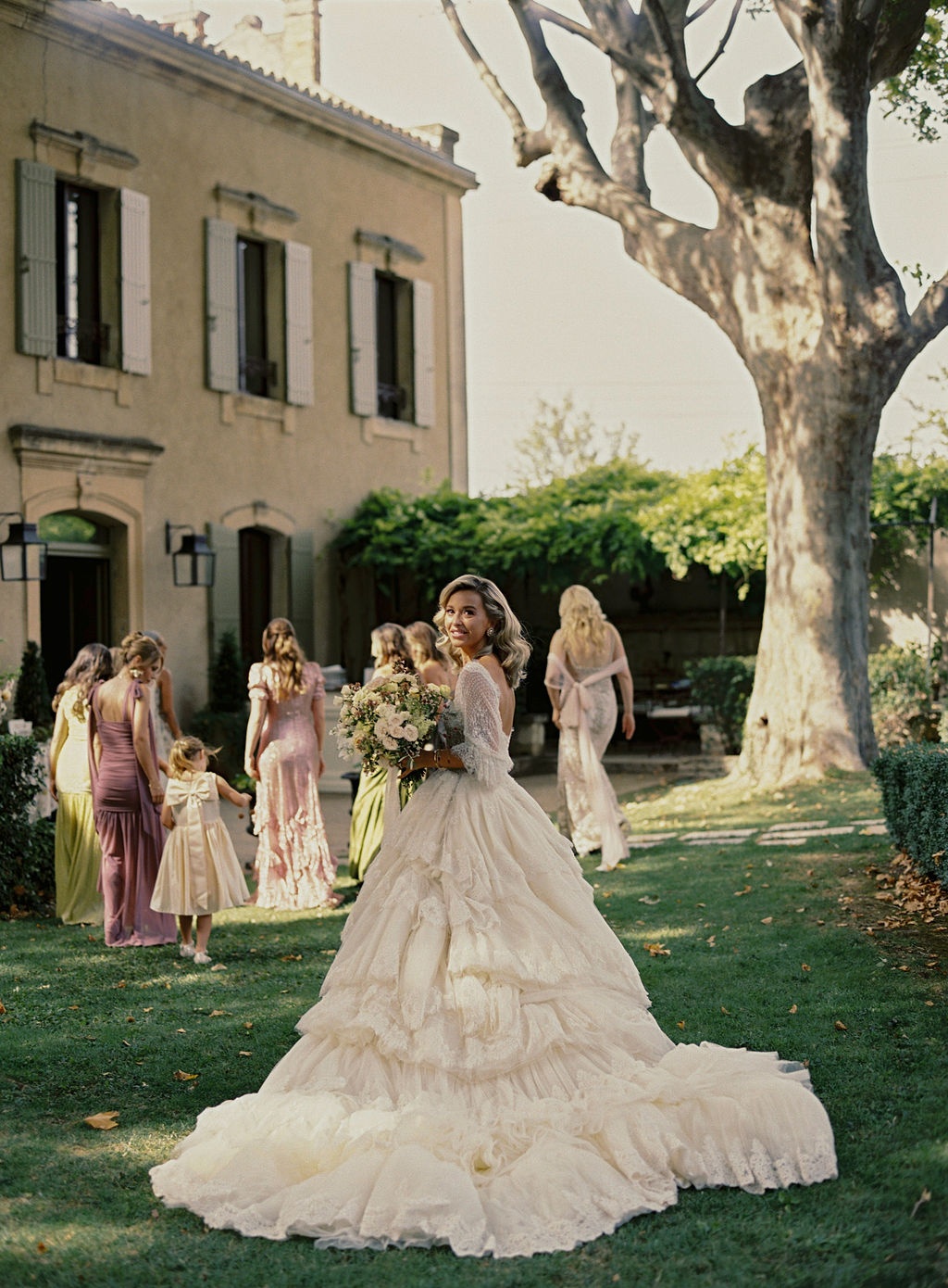bride and bridesmaid sharing a moment at La Bastide de Laurence, Provence