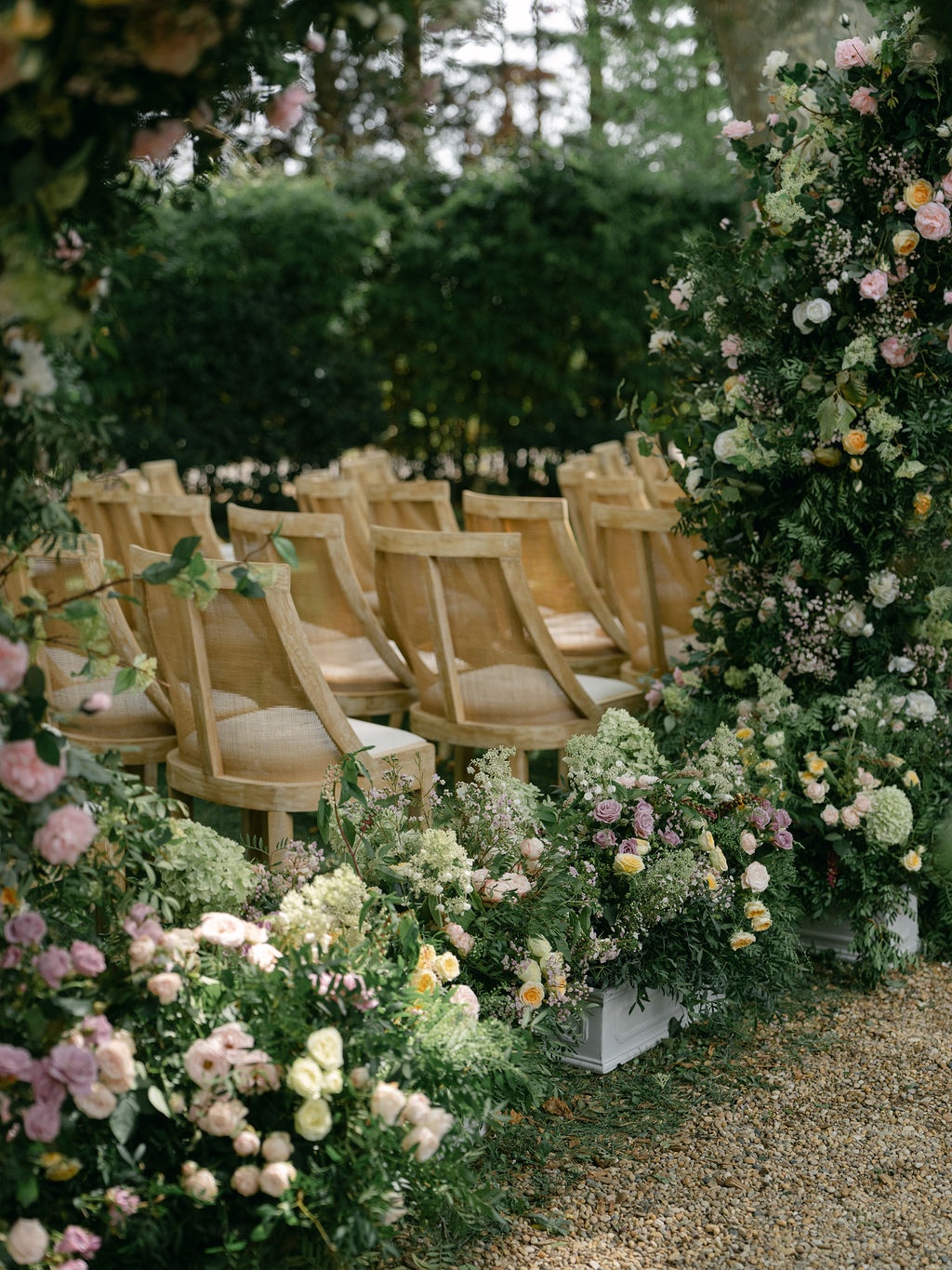 wide view of the ceremony with bastide wall behind at La Bastide de Laurence, Provence