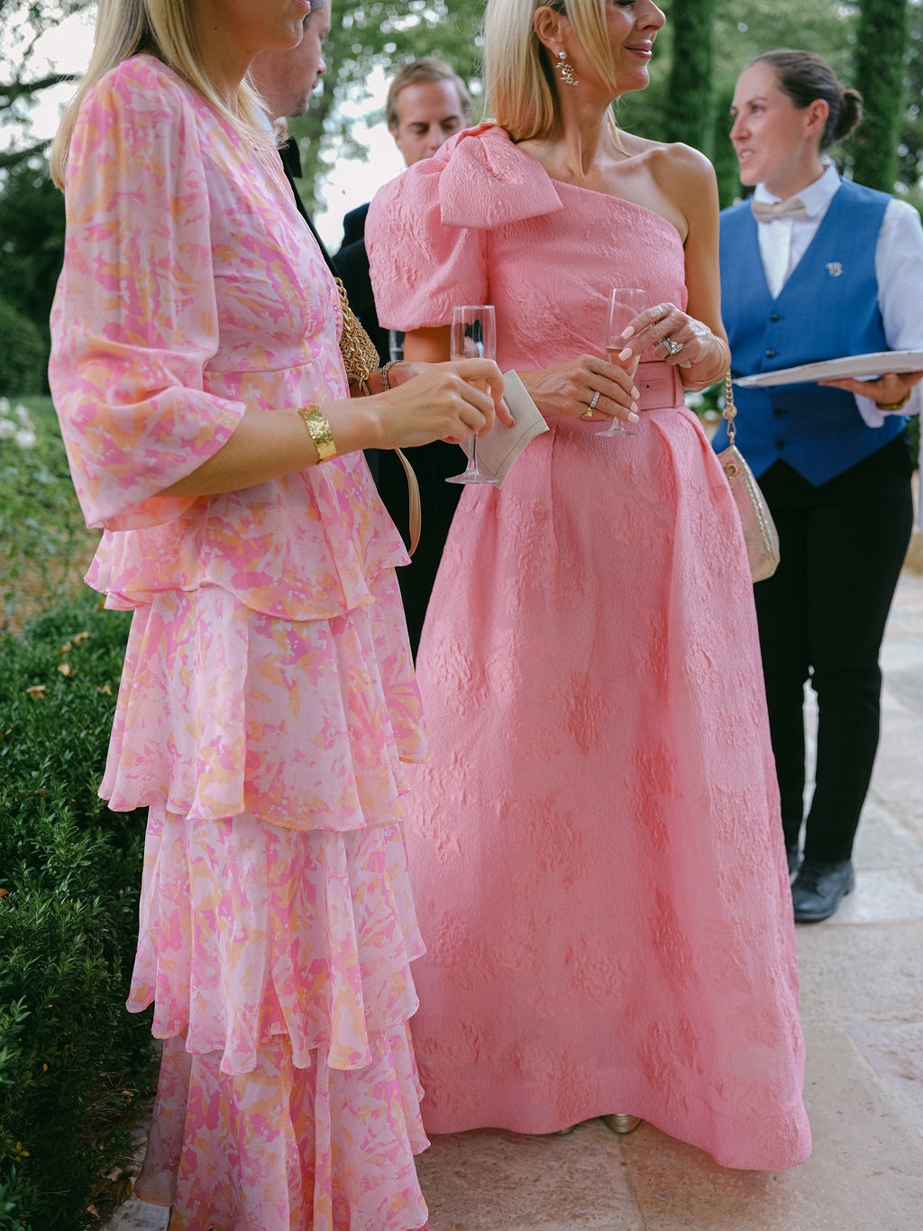 guests gathered near stone urns for drinks at La Bastide de Laurence, Provence