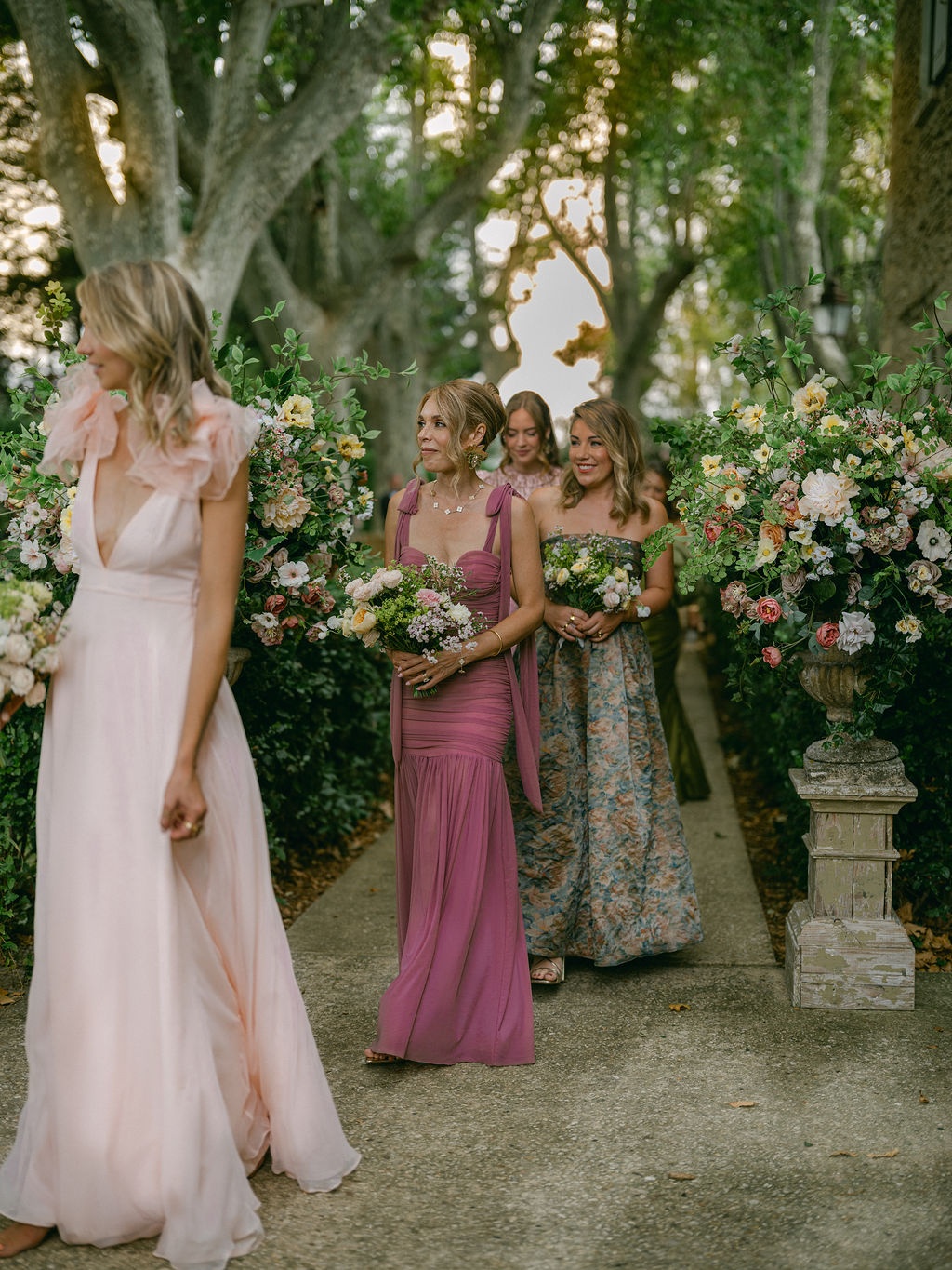 bridesmaids on the olive-lined garden path at La Bastide de Laurence, Provence