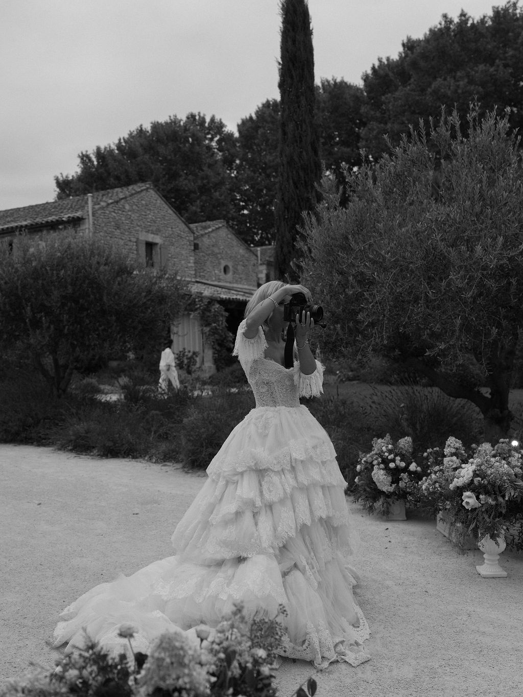bride with camera at dusk in black and white at La Bastide de Laurence, Provence