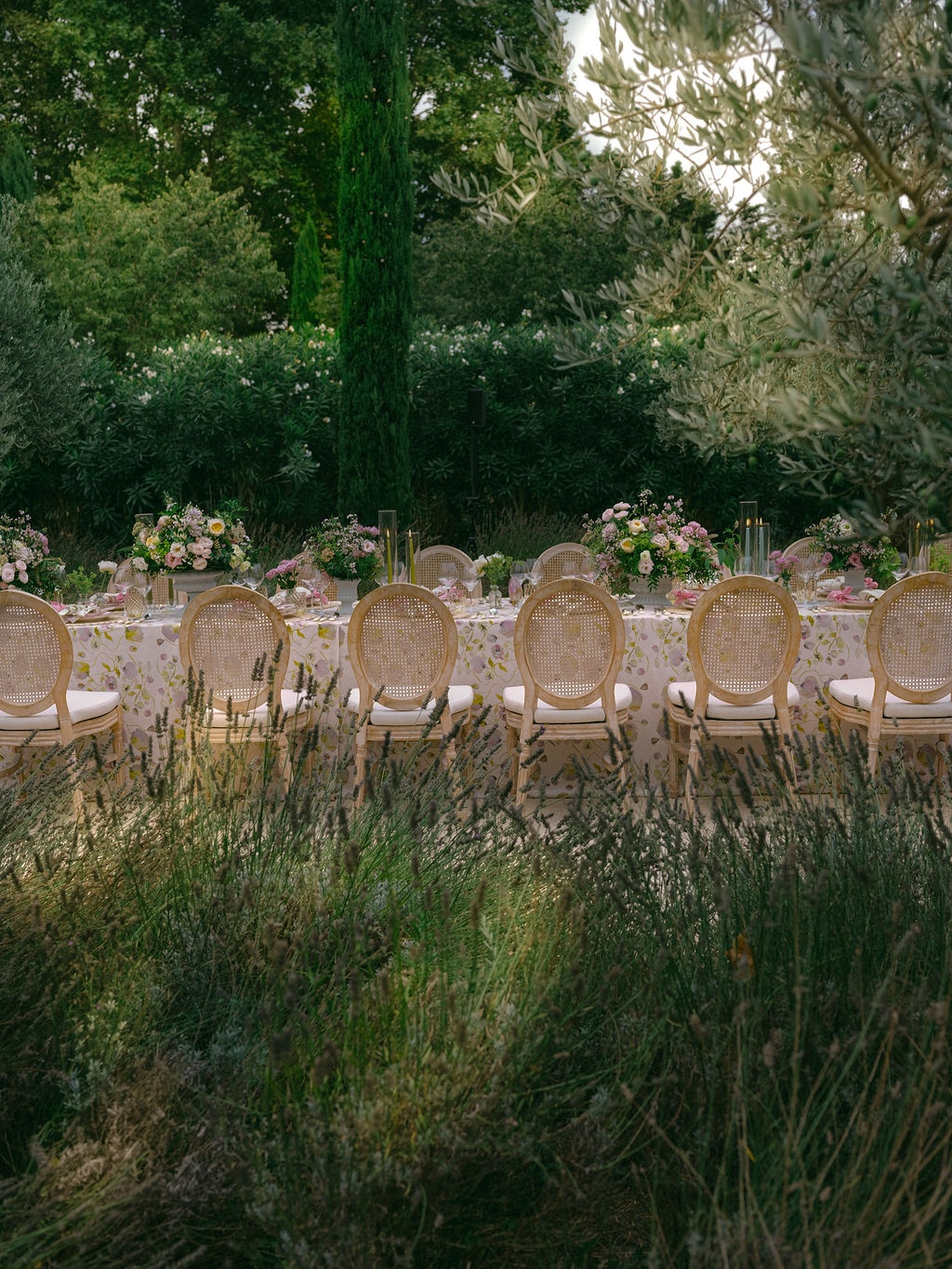 couple leaning in across the table at La Bastide de Laurence, Provence