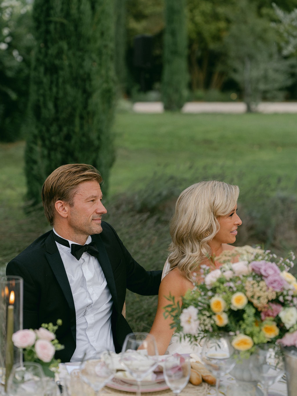 guests toasting down the candlelit table at La Bastide de Laurence, Provence