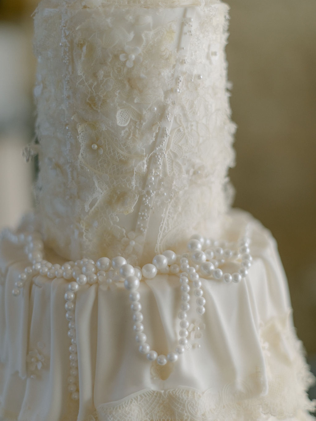 close detail of the wedding cake with pearls at La Bastide de Laurence, Provence