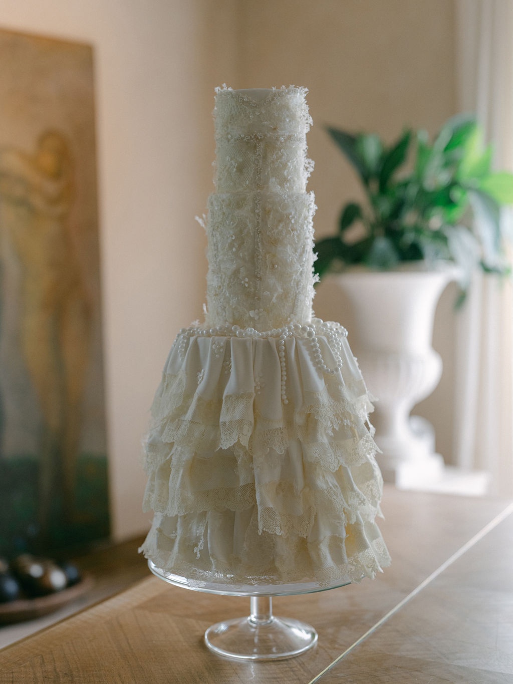 full wedding cake with lace and silk tiers at La Bastide de Laurence, Provence