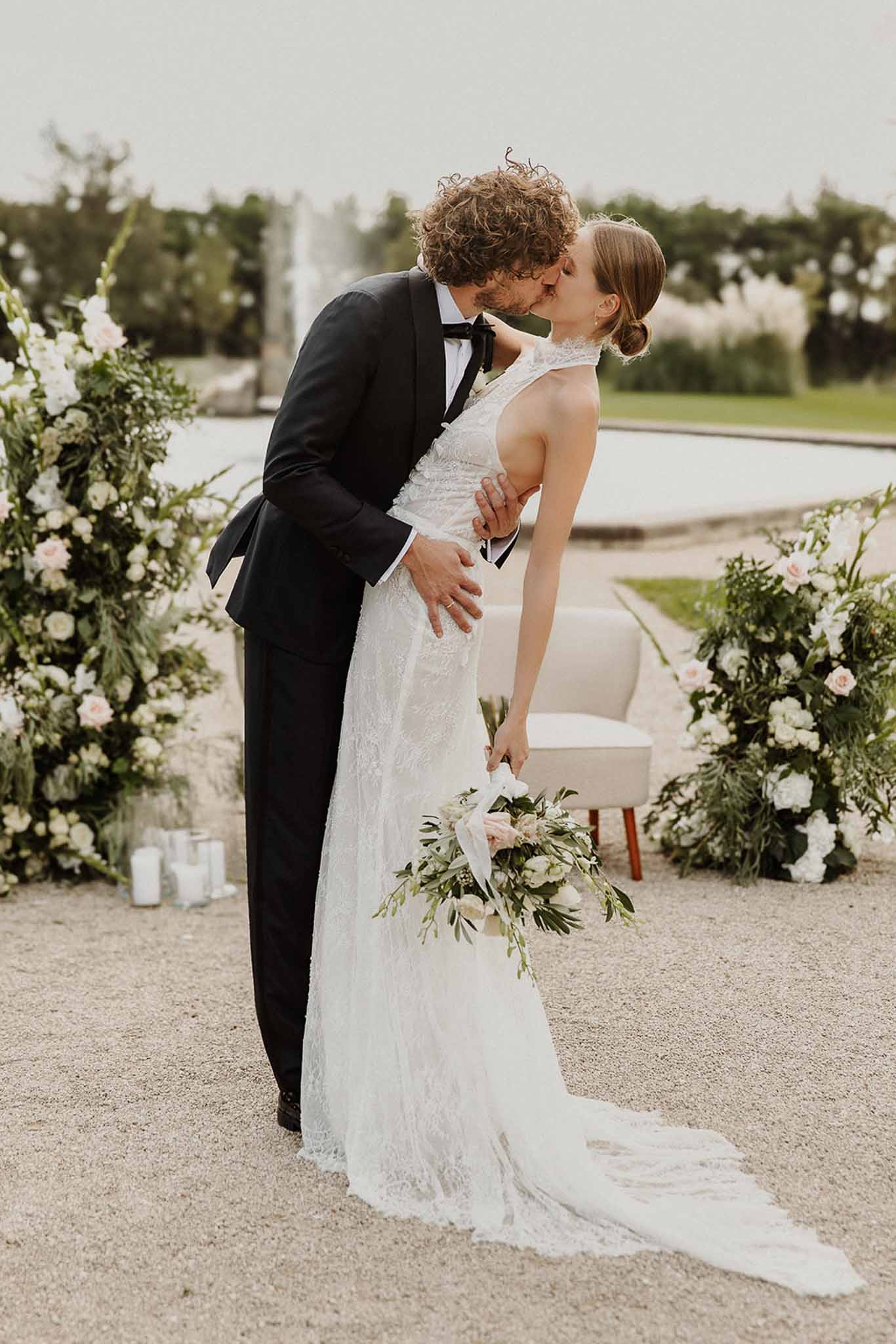 Wedding ceremony in a garden with white roses