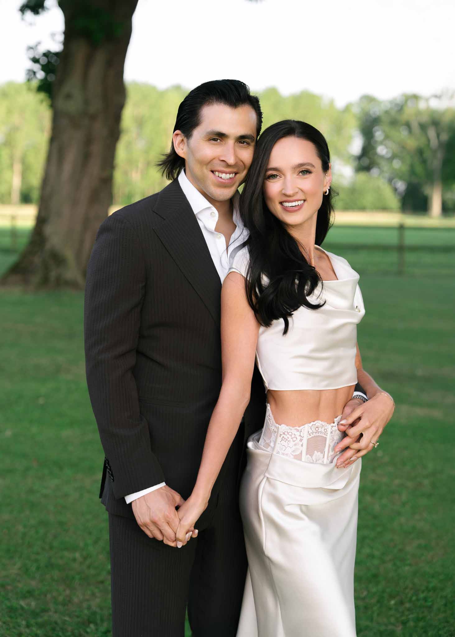 Bride and groom walking hand in hand