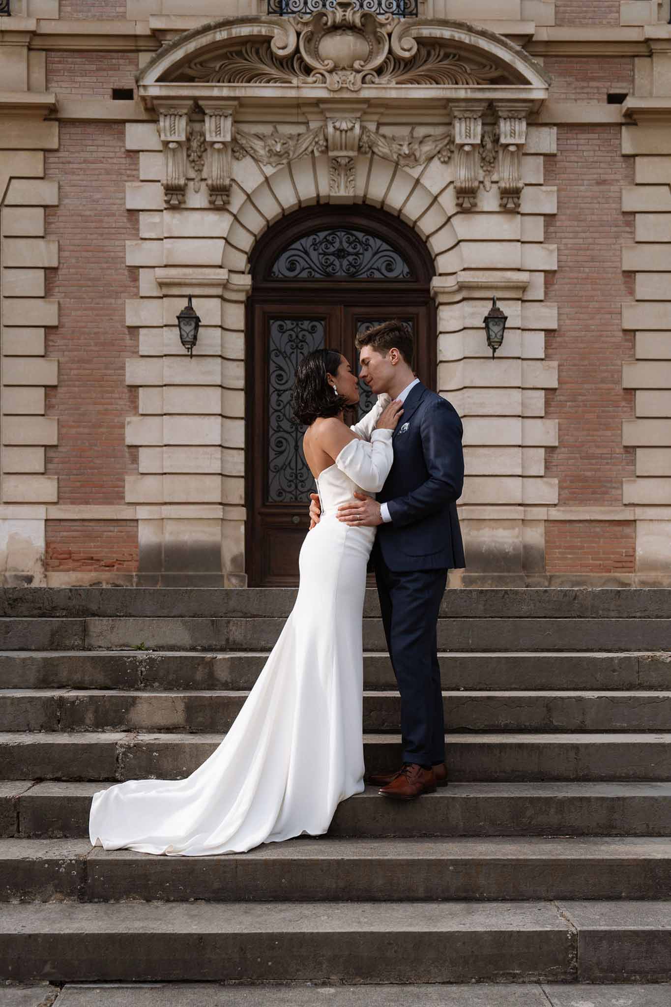 Bride and groom kissing