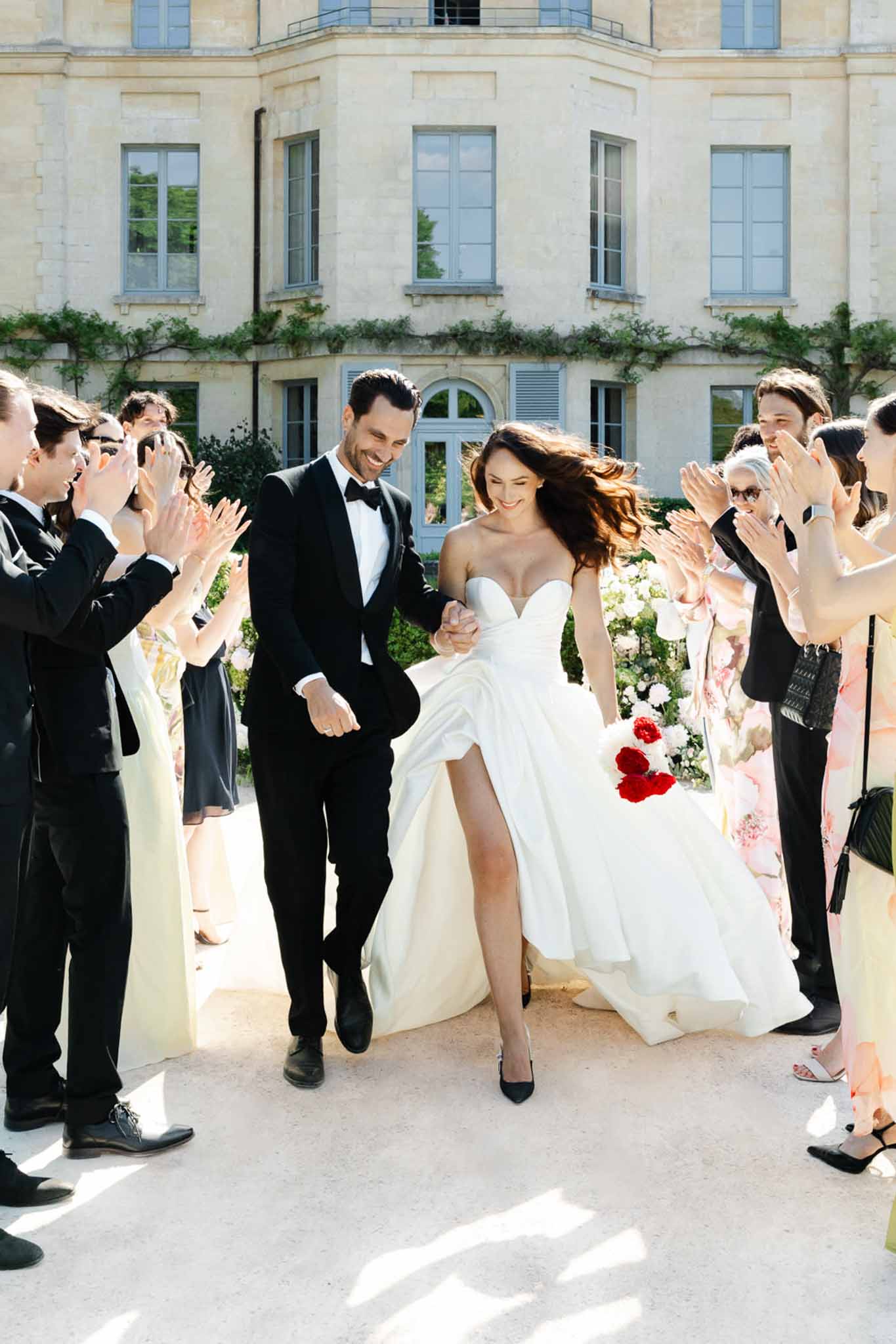 Bride and groom walking hand in hand