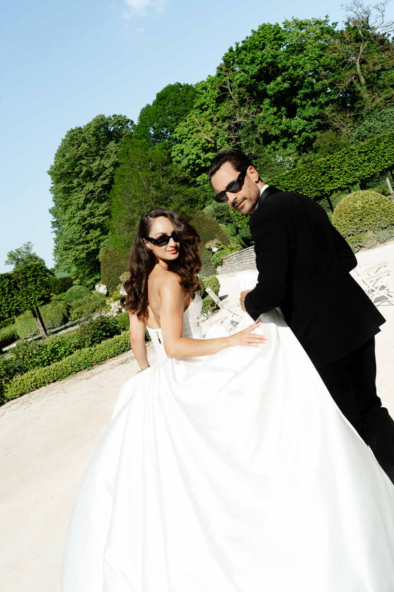 Bride and groom portrait in a garden
