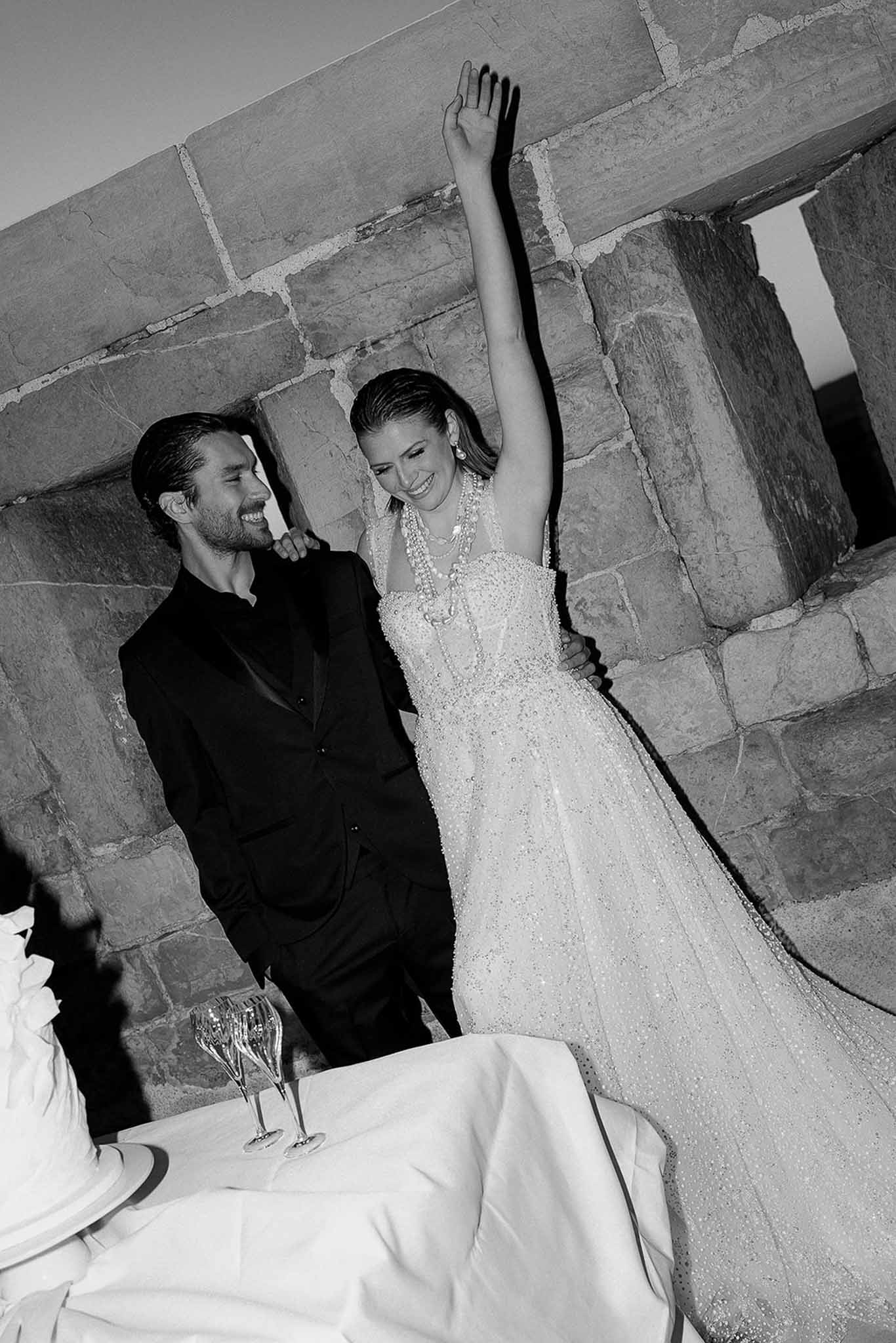 Black and white photo of wedding reception table setting