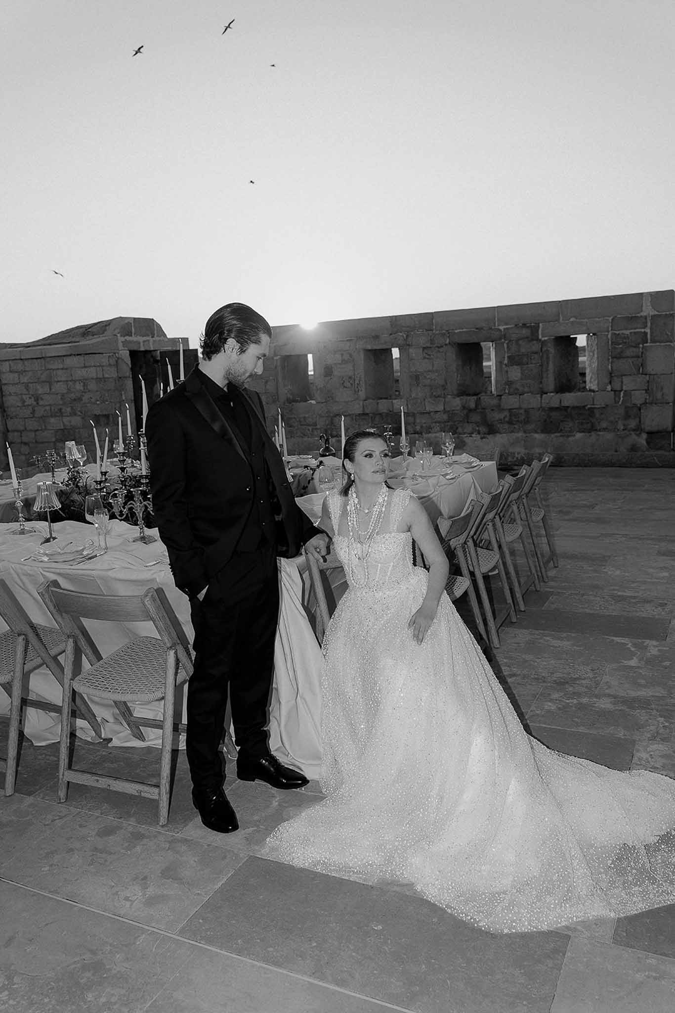 Black and white photo of wedding reception table setting