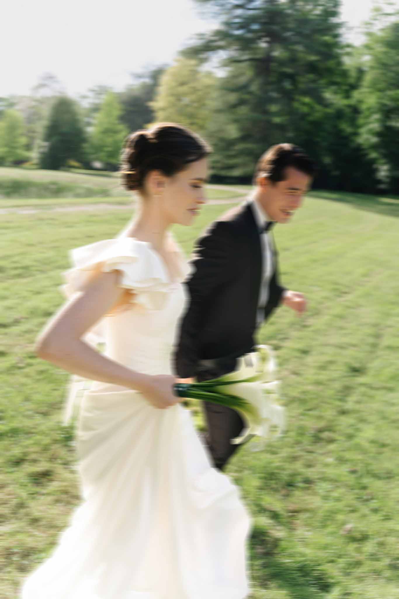 Bride and groom walking hand in hand