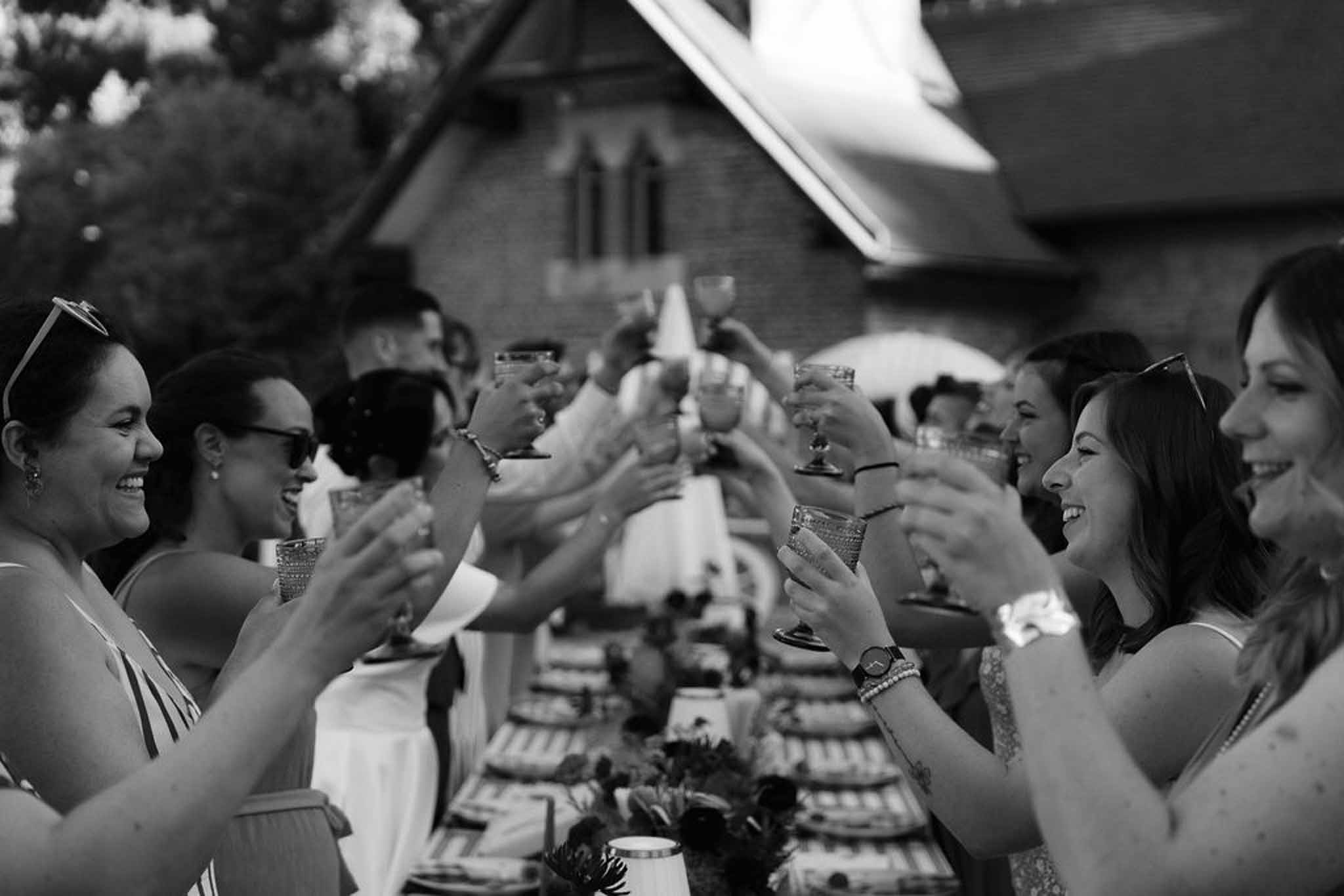 Black and white photo of wedding reception table setting