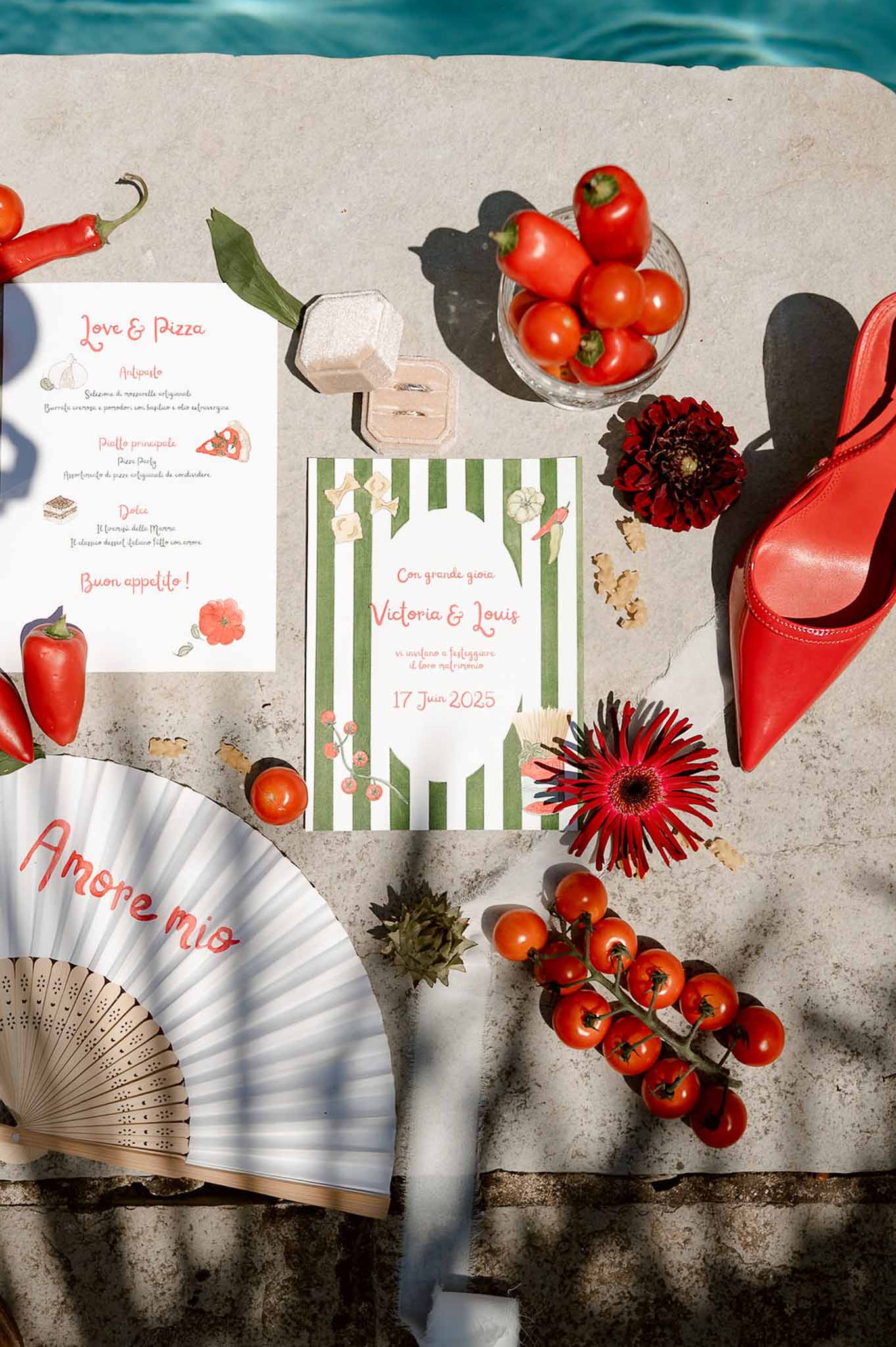 Italian-themed wedding stationery with pasta illustrations, red heel, dahlia, cherry tomatoes, and ring box