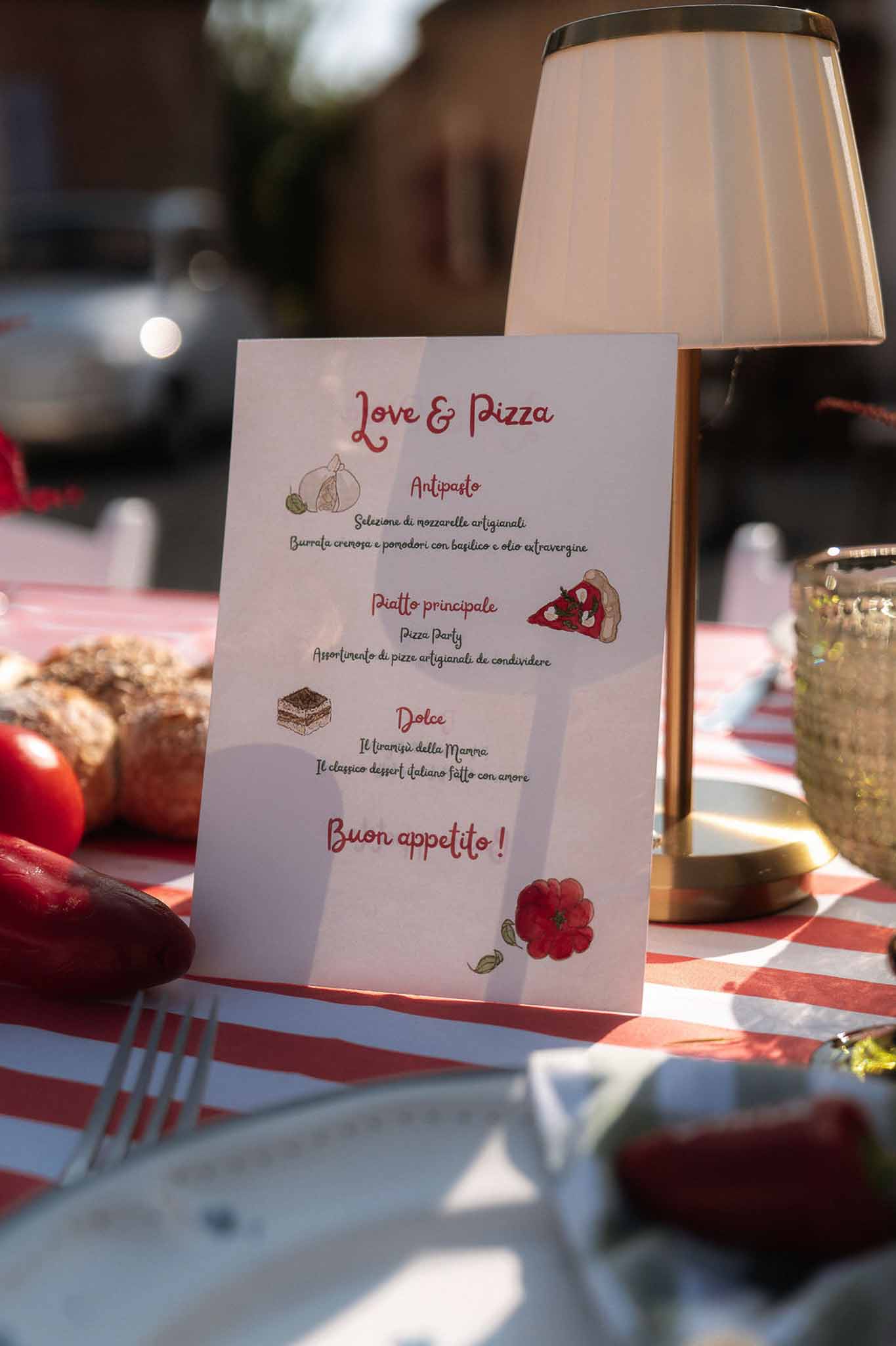 Wedding reception table setting with white roses