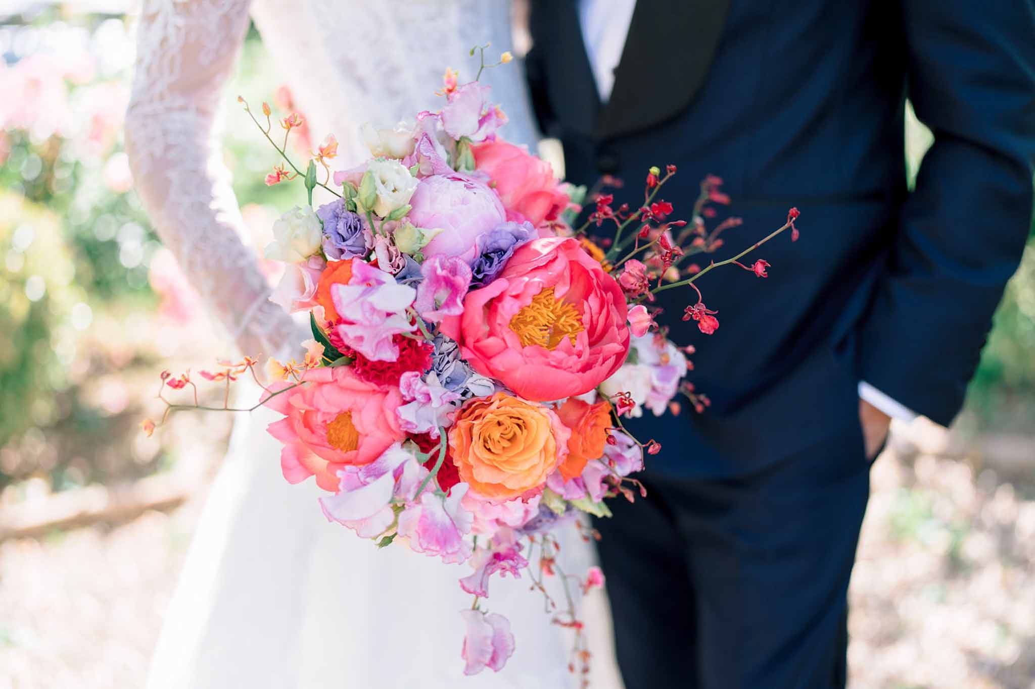 Wedding bouquet in a garden with white roses