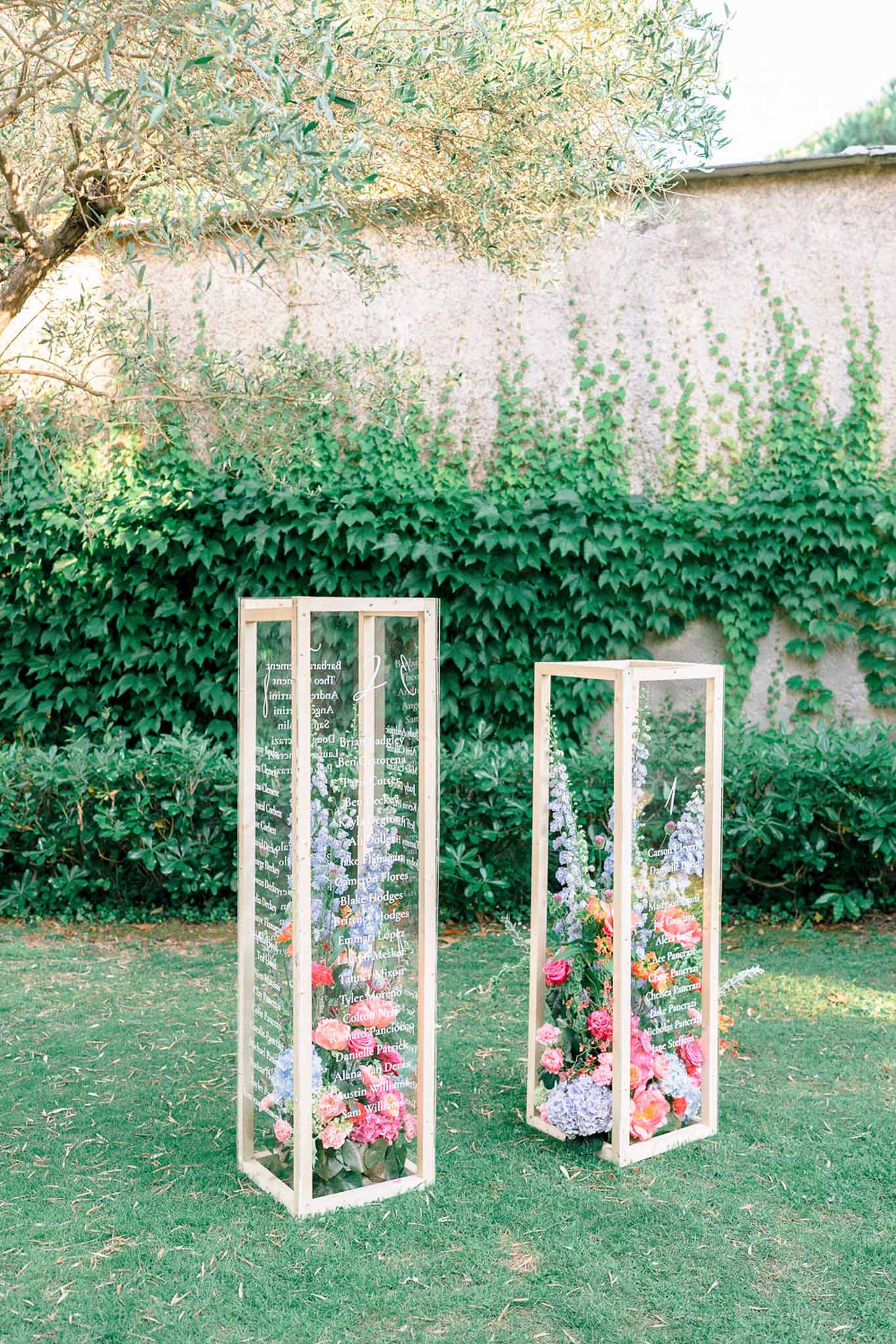 Wedding rings in a garden with white roses