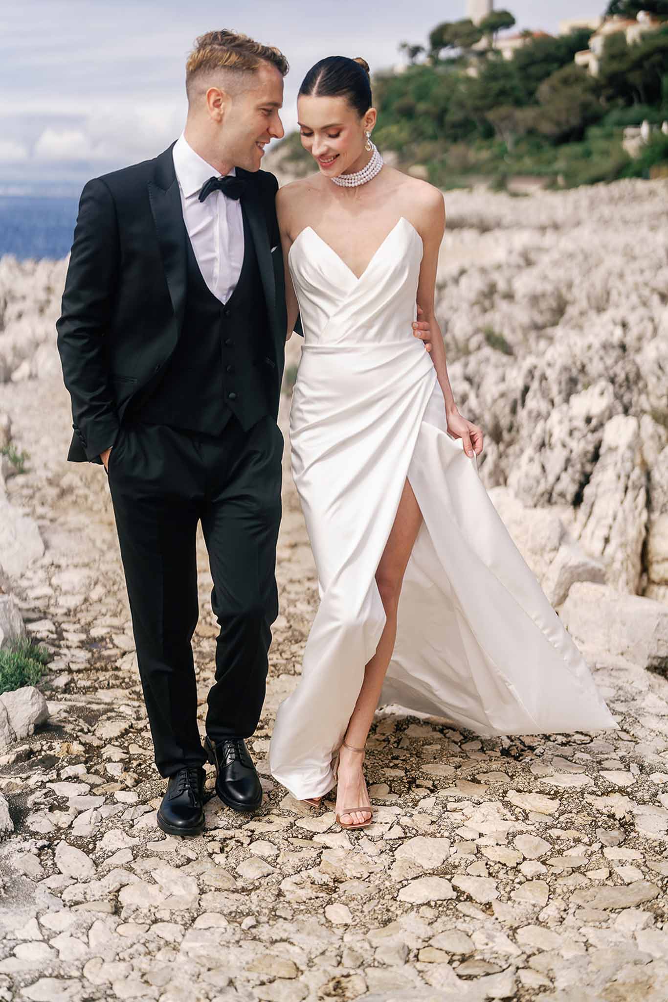 Bride and groom walking hand in hand