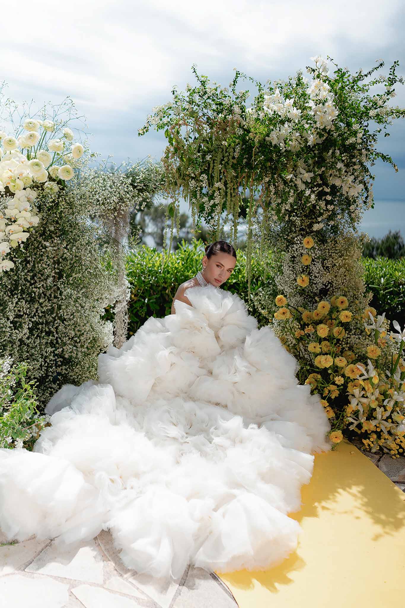 Wedding ceremony in a garden with white roses