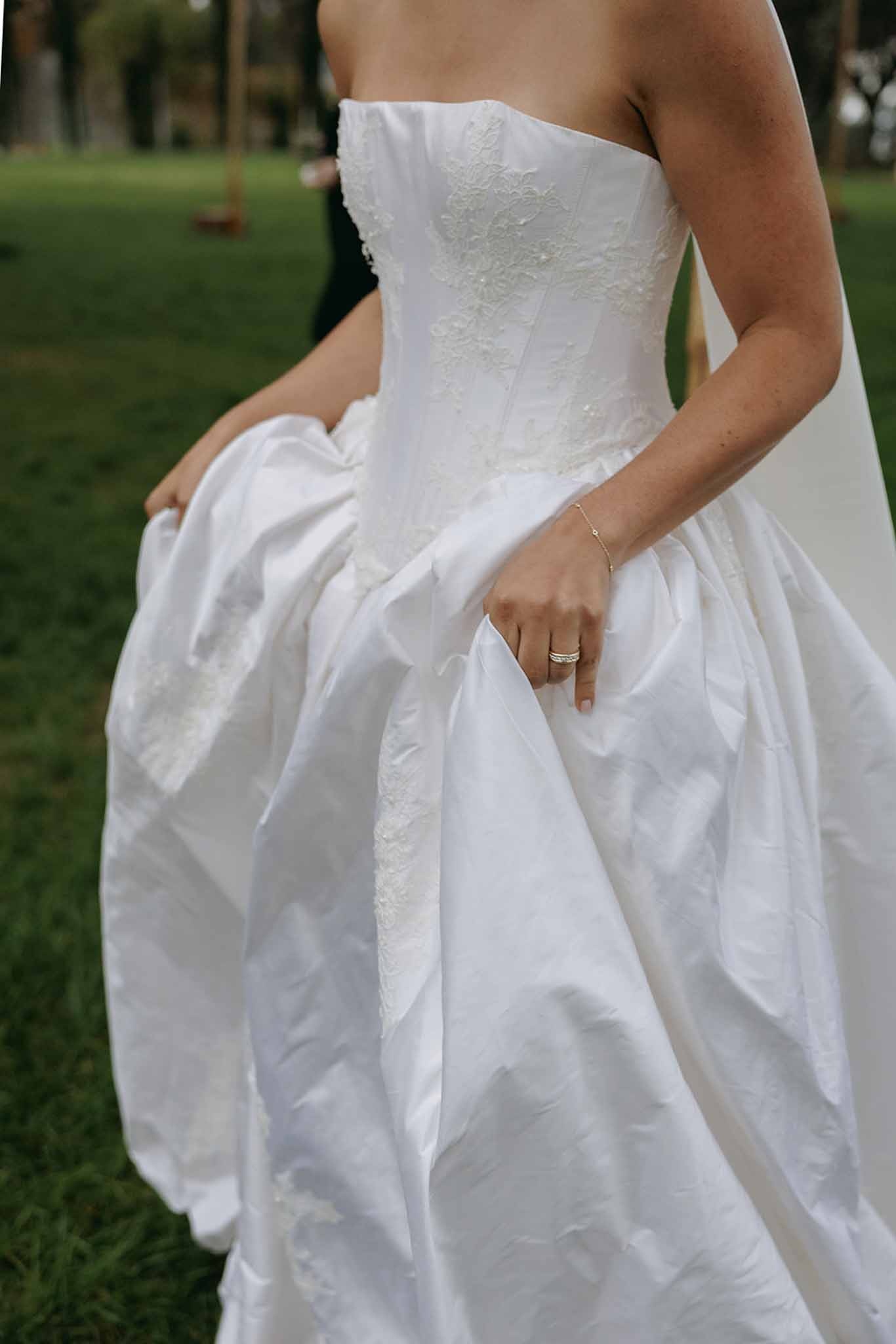 Close up of bride's corset bodice and taffeta skirt at Domaine Rocabella, Cote d'Azur