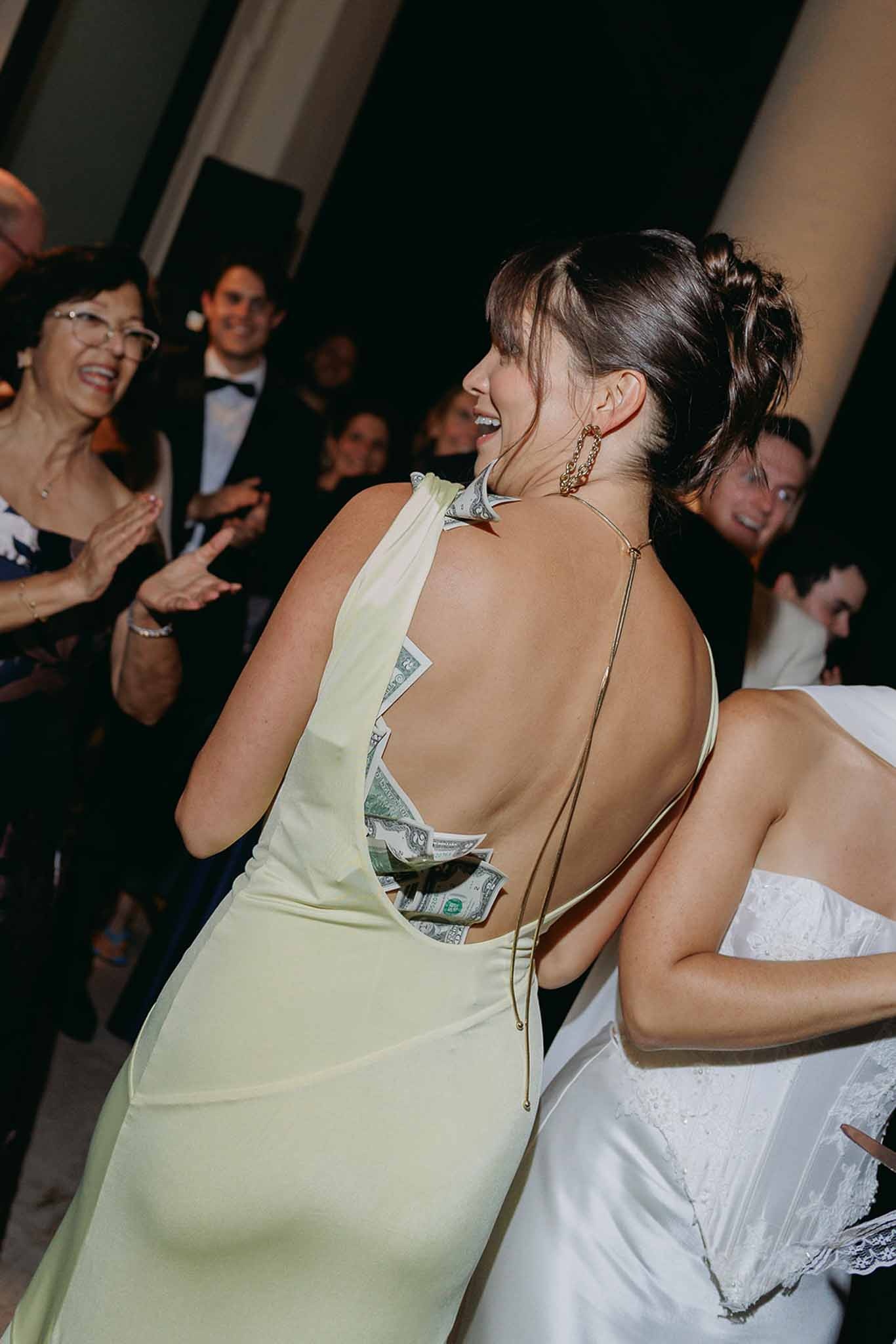 Money dance with bridesmaid and bride at reception at Domaine Rocabella, Cote d'Azur